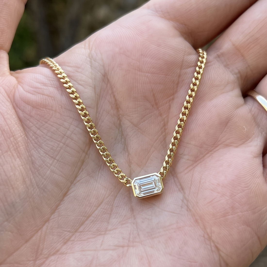 Kiashaa Jewellery 1.73 CT emerald-cut diamond Cuban chain necklace in polished yellow gold.