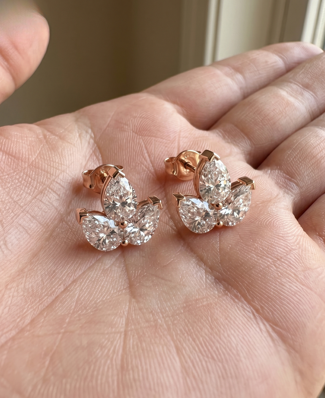 Luxury pear diamond earrings in rose gold for wedding, anniversary, and gifting.