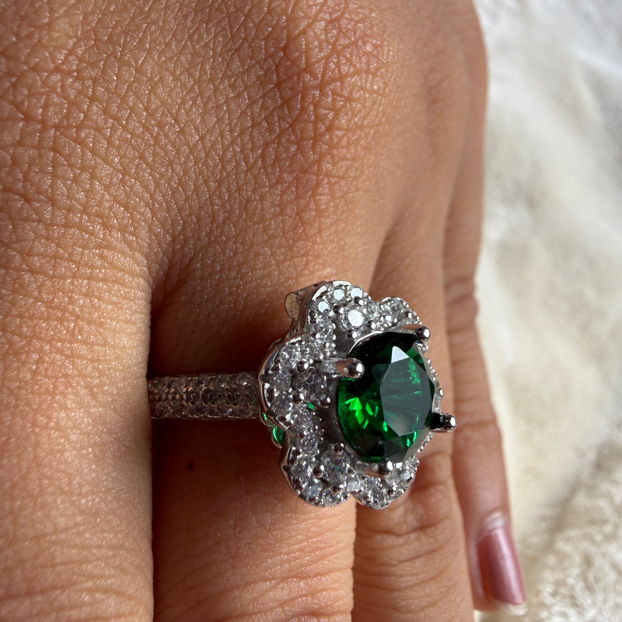 Green gemstone floral halo ring with lab-grown diamonds by Kiashaa Jewellery.