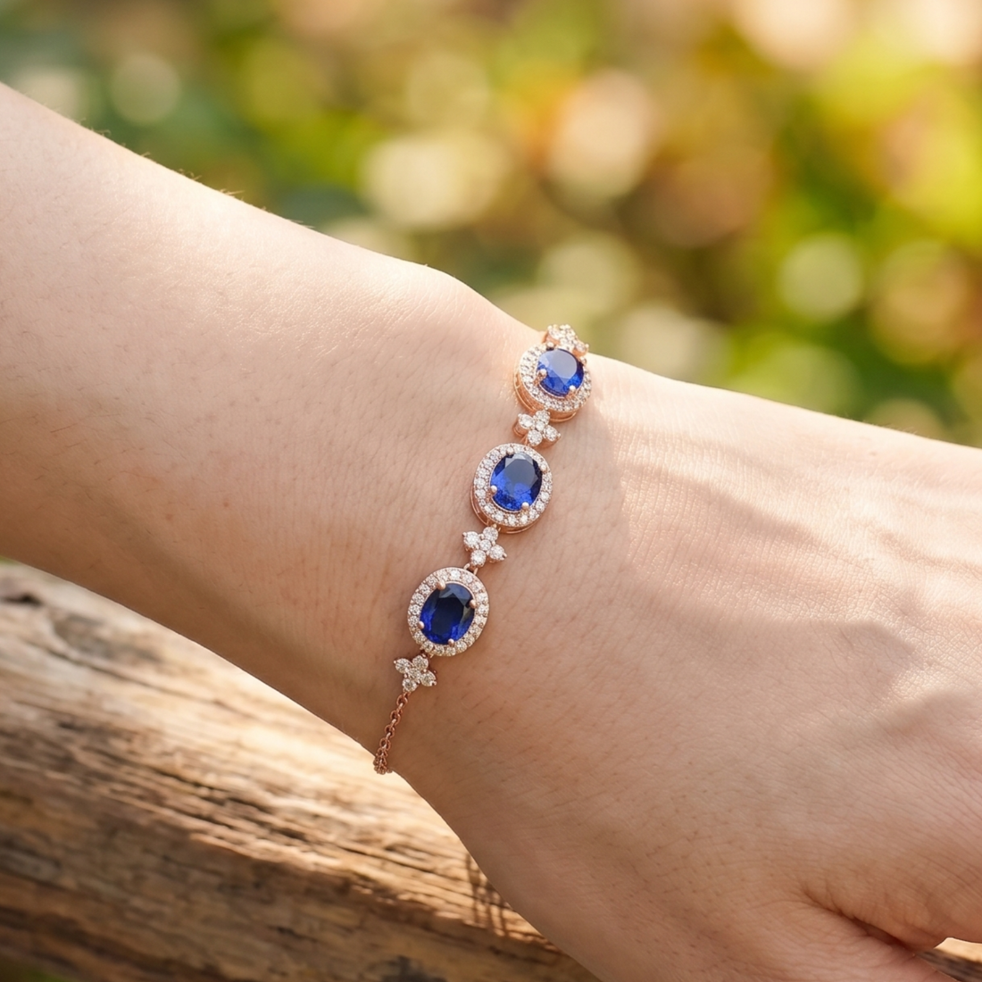 Royal blue oval gemstone bracelet with round lab-grown diamond halos by Kiashaa Jewellery.