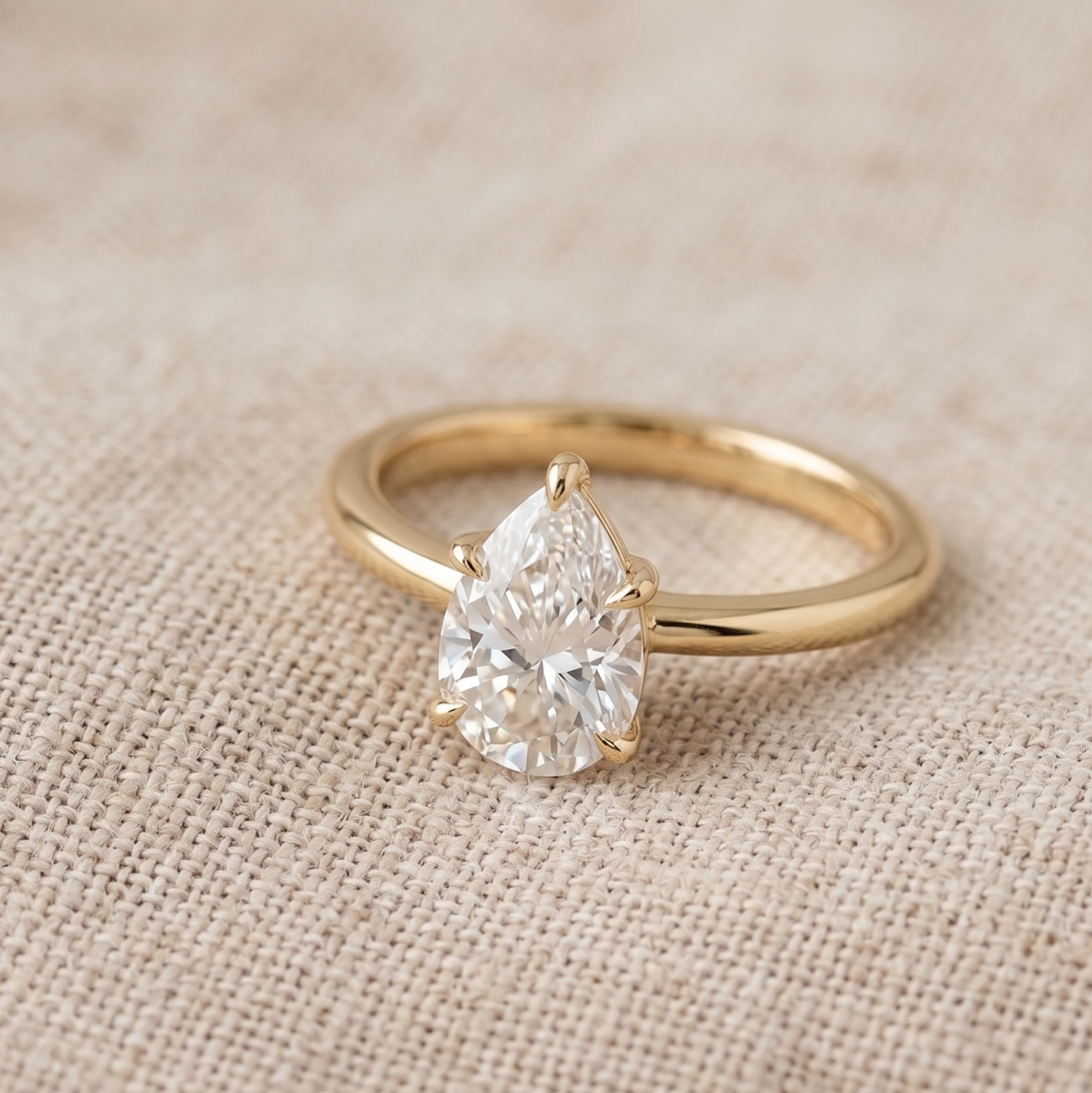 0.76 carat pear diamond engagement ring in 9K 14K and 18K gold