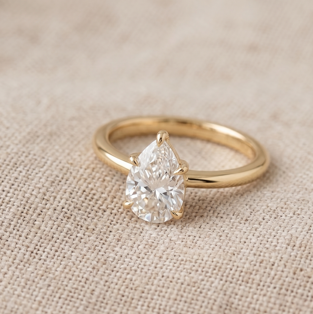 0.76 carat pear diamond engagement ring in 9K 14K and 18K gold