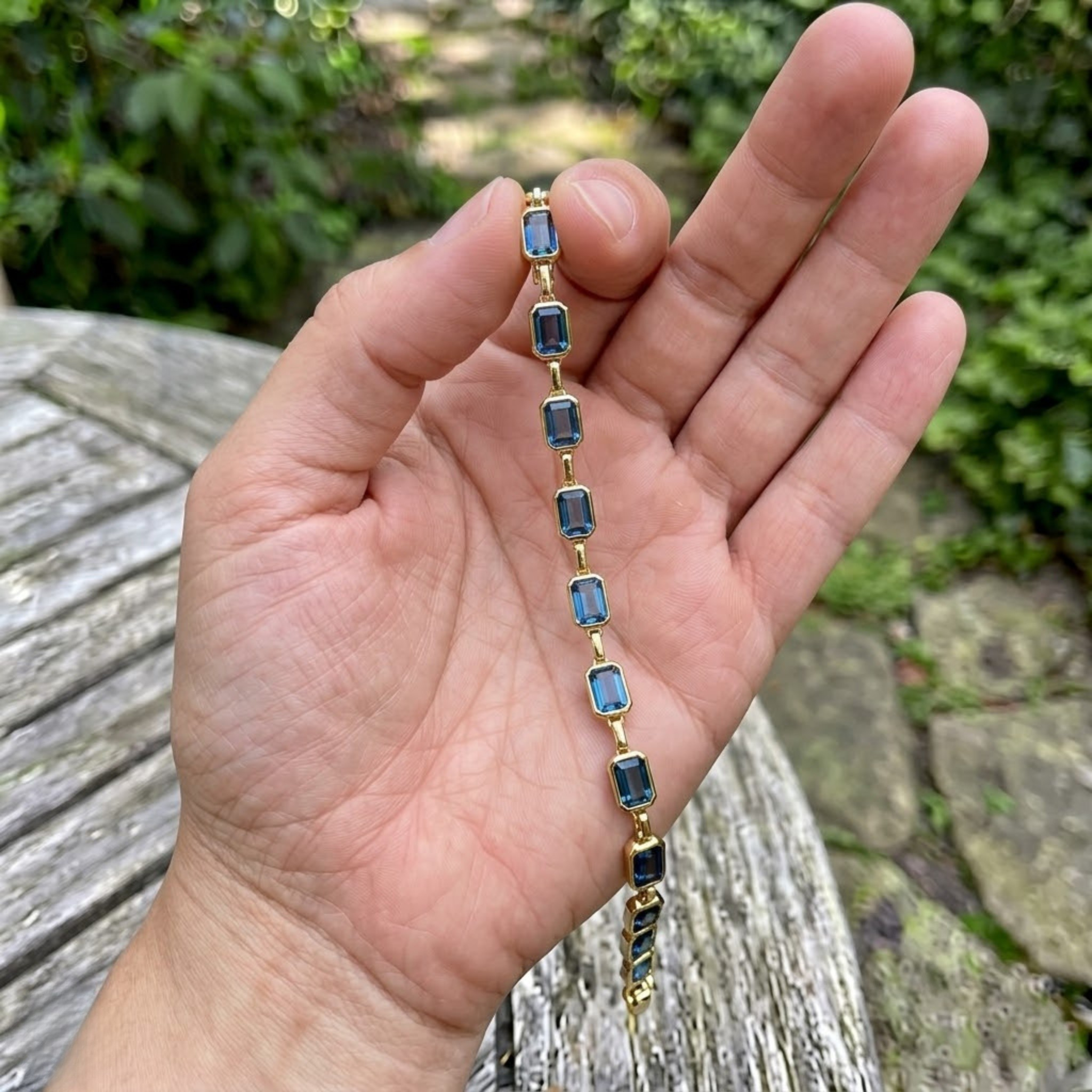 Classic gemstone tennis bracelet available in white, yellow, and rose gold.