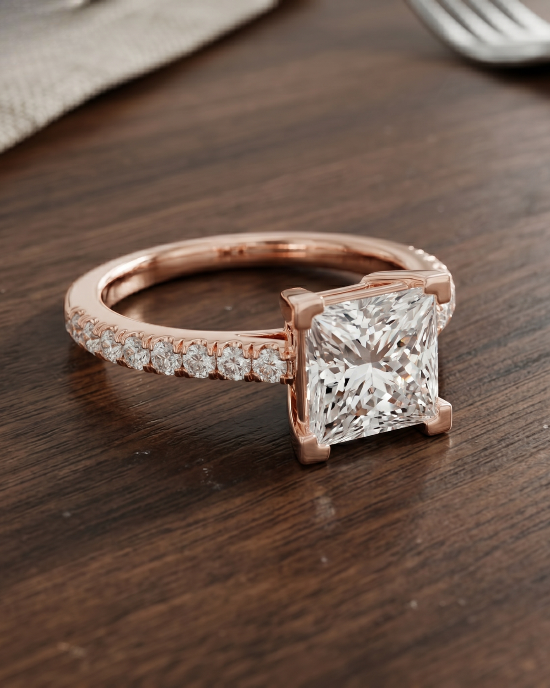 Luxury princess and round lab-grown diamond ring by Kiashaa Jewellery in rose gold for engagements and gifting.