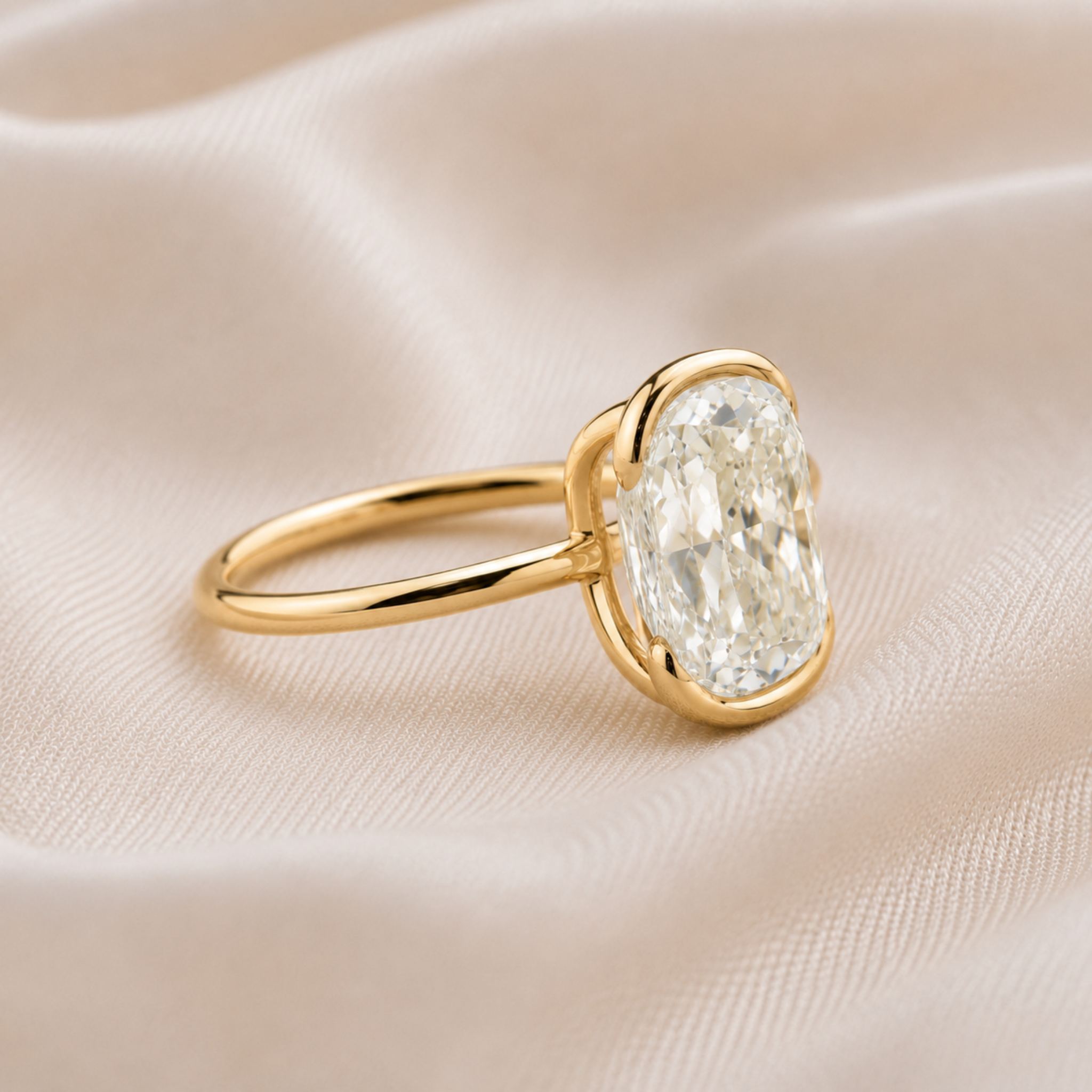Large oval diamond engagement ring with minimalist yellow gold band