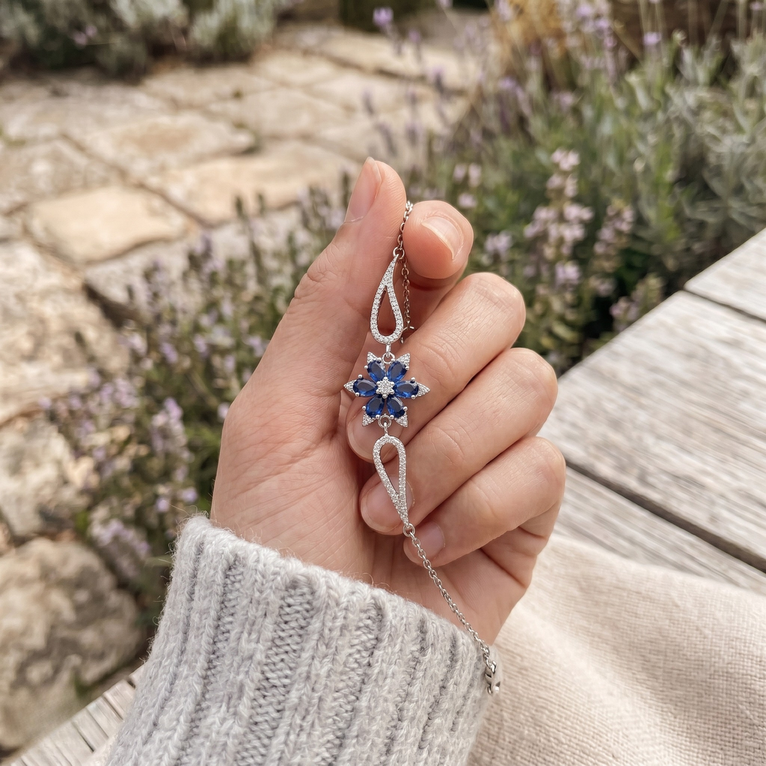 Blue pear gemstone and lab-grown diamond floral bracelet by Kiashaa Jewellery.