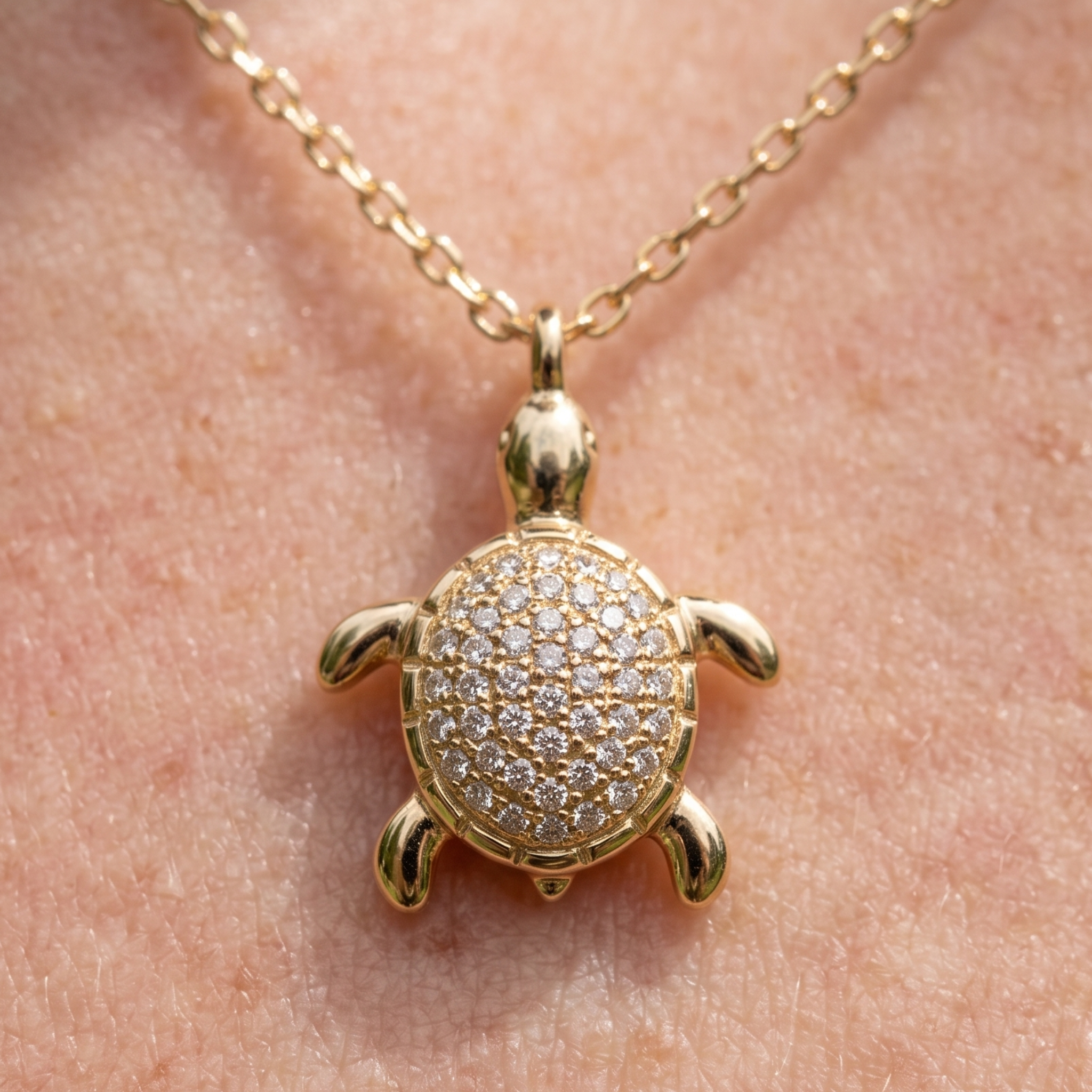 0.37 CTW diamond turtle pendant necklace in polished yellow gold.