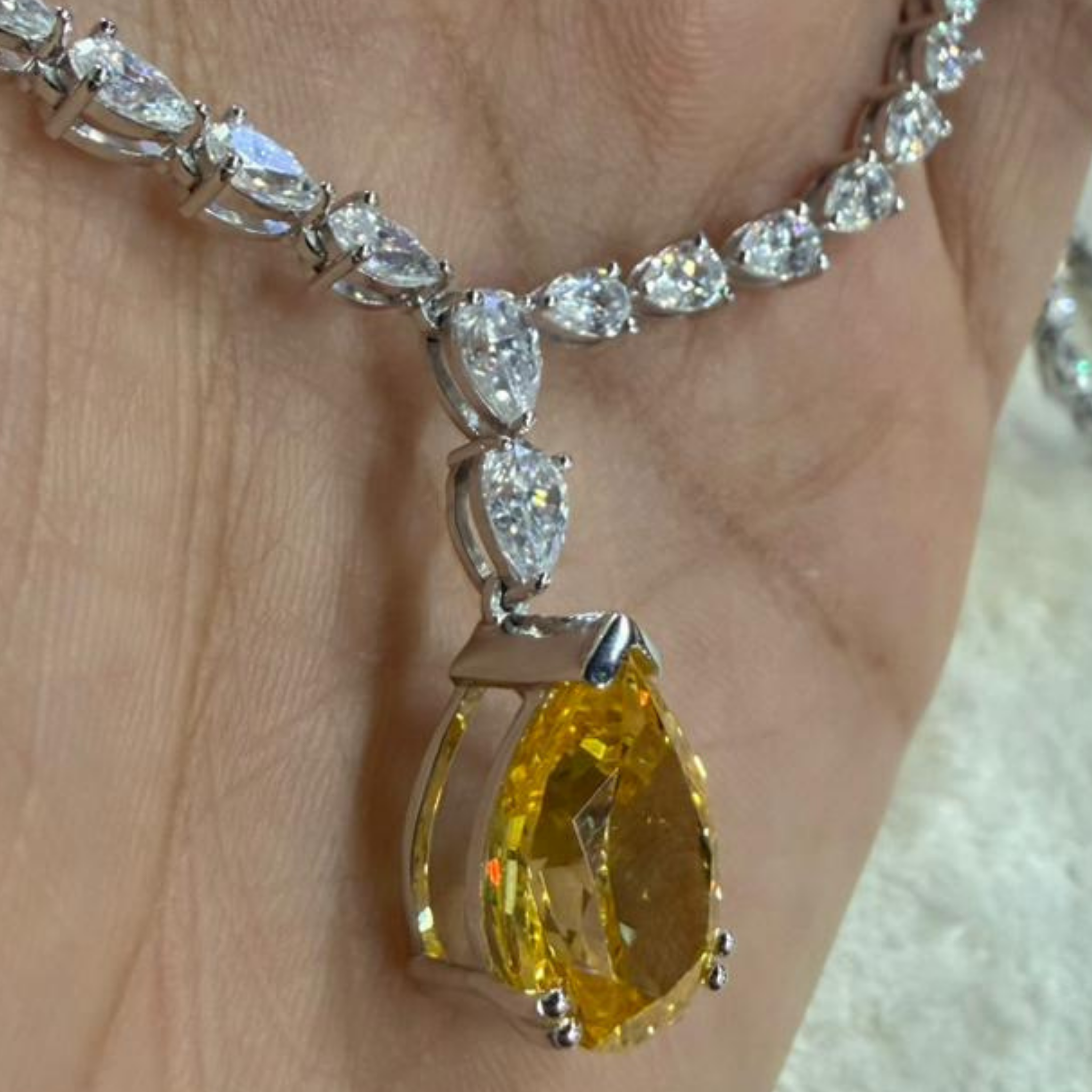 Luxury statement necklace featuring 74 listed pear-shaped stones in a graduated arrangement.