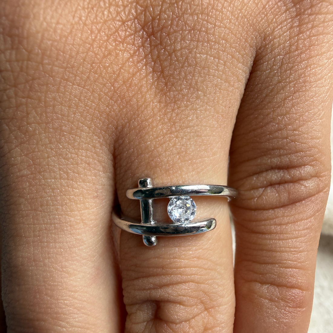 Modern round lab-grown diamond open ring in white gold by Kiashaa Jewellery.