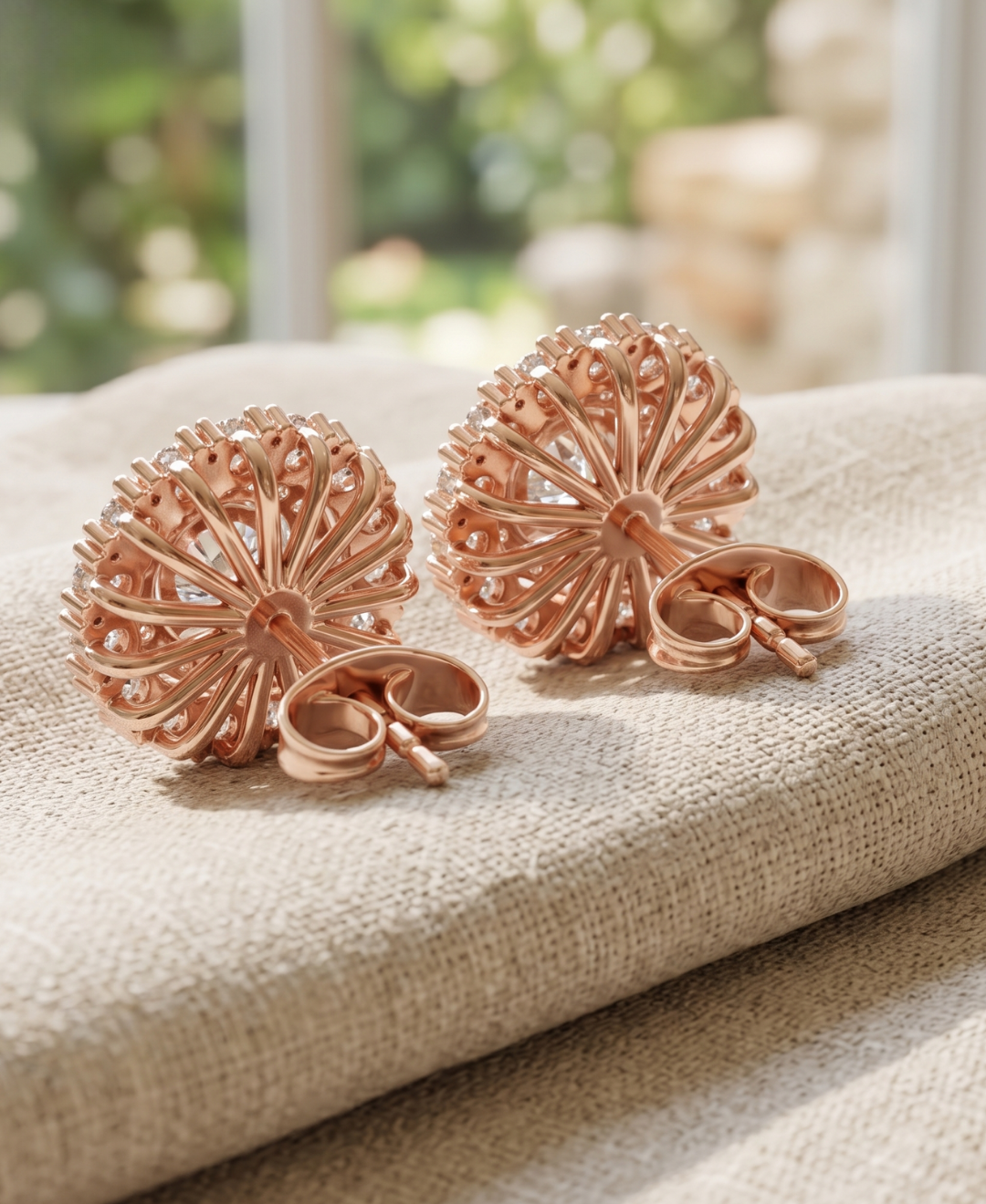 Luxury round diamond halo earrings in rose gold for bridal jewellery and weddings.