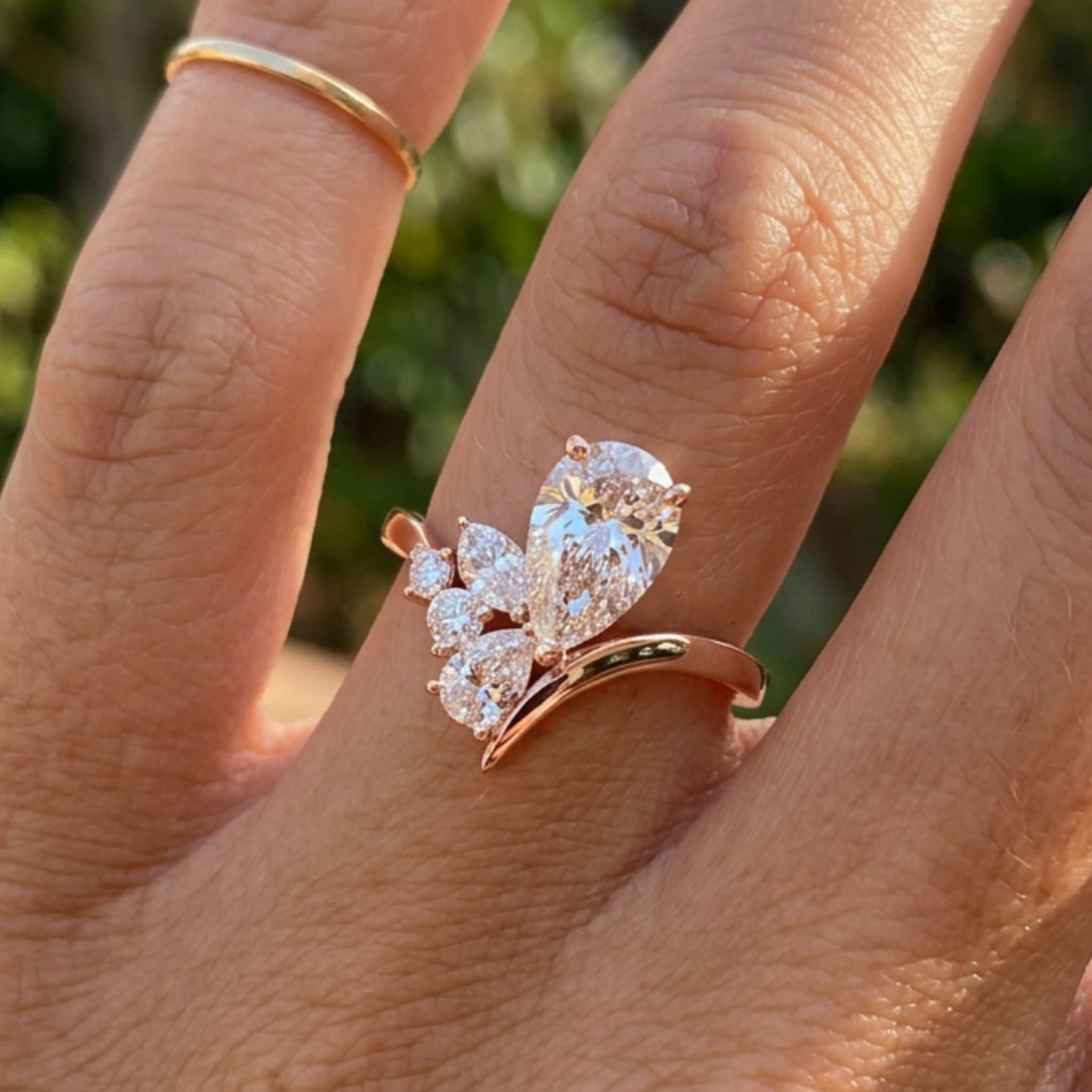 Flora Embrace 3 CTW lab-grown diamond ring by Kiashaa Jewellery with a 2 CT pear center and multi-shape side diamonds.