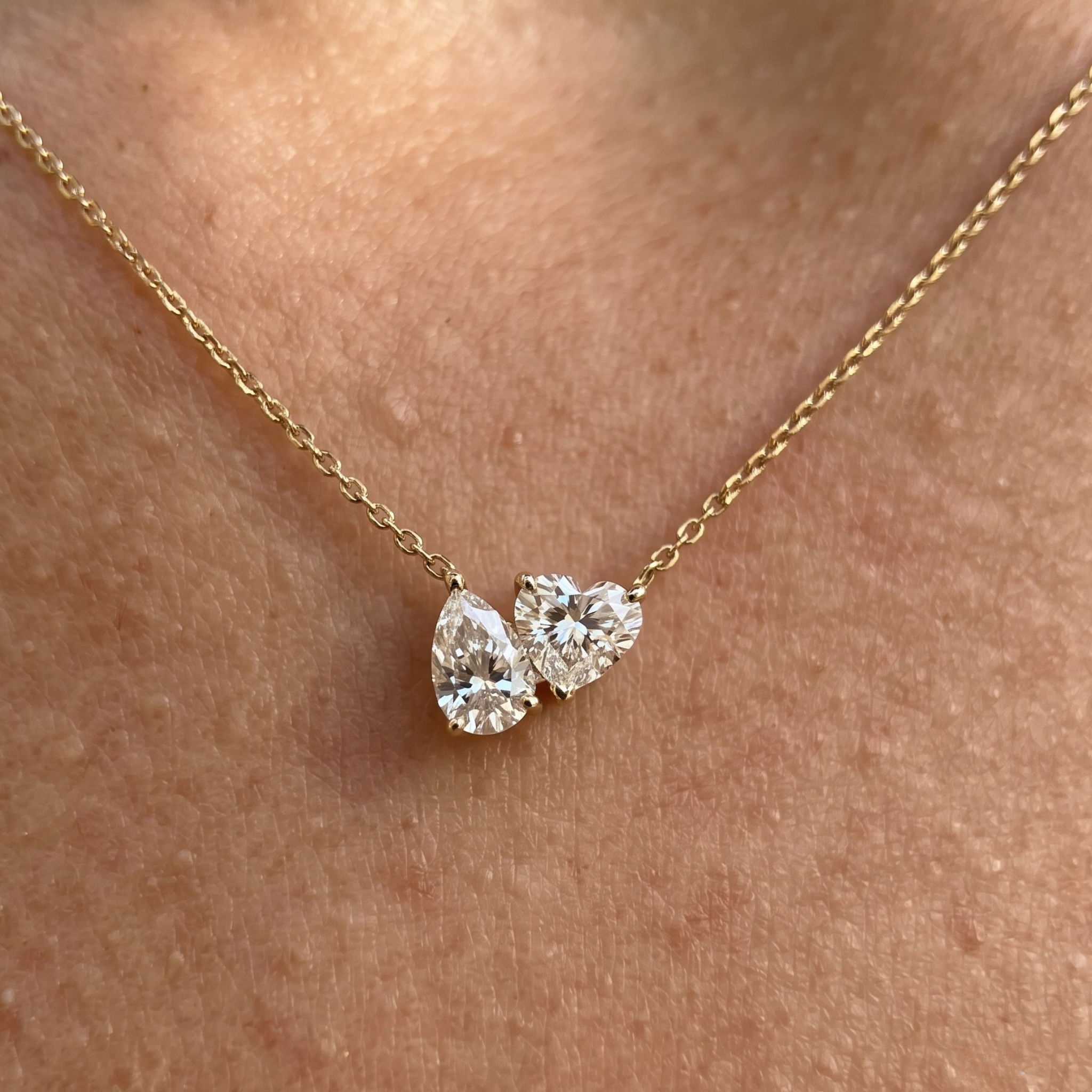 Kiashaa Jewellery 1.45 CTW pear and heart diamond necklace in polished yellow gold.