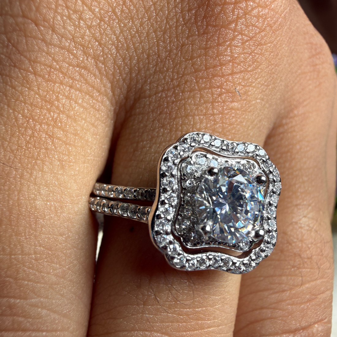 Round halo lab-grown diamond engagement ring in white gold by Kiashaa Jewellery.