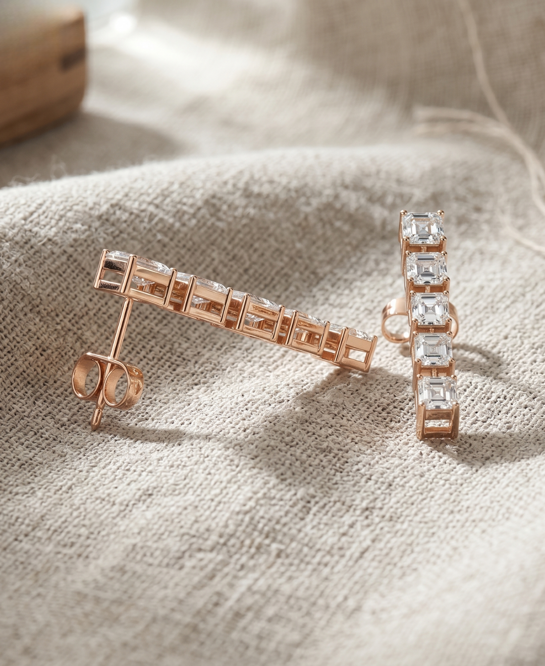 Luxury emerald-cut lab-grown diamond earrings by Kiashaa Jewellery in rose gold for weddings and evening wear.