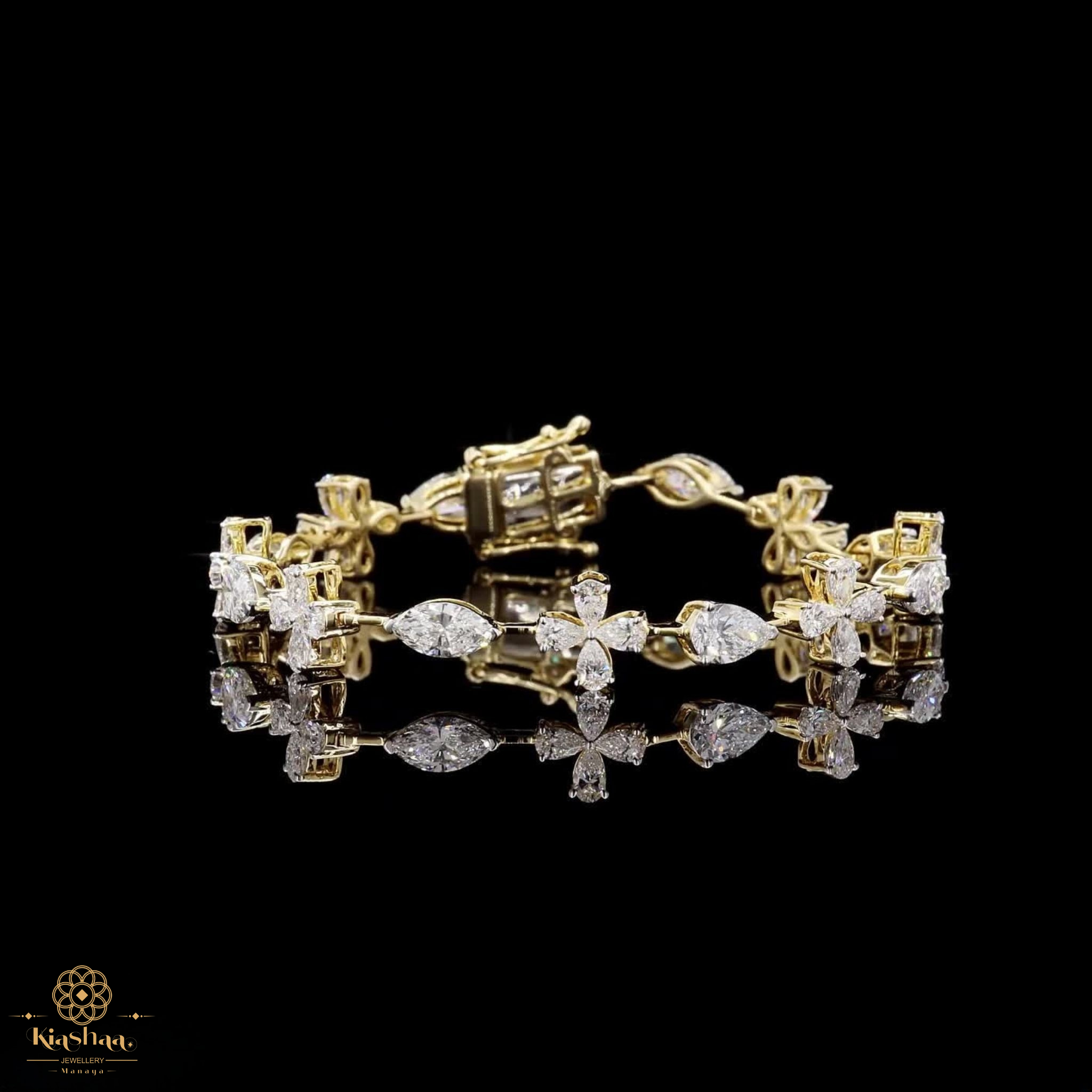 A yellow gold bracelet adorned with clear marquise and round-cut gemstones, displayed on a reflective black surface against a solid black background. A logo for 'Kavute Jewelry' is visible in the bottom-left corner.