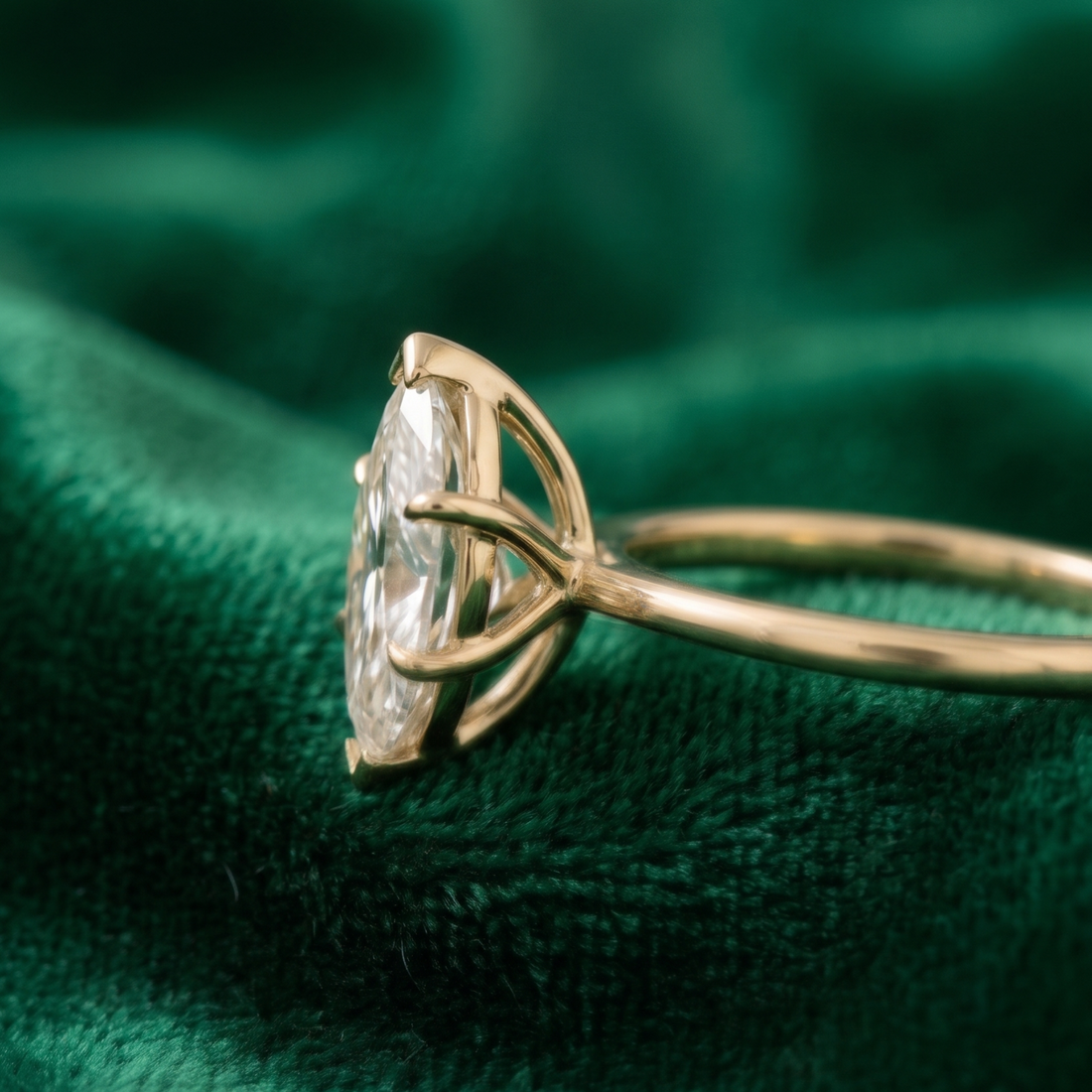 Yellow gold marquise diamond solitaire proposal ring