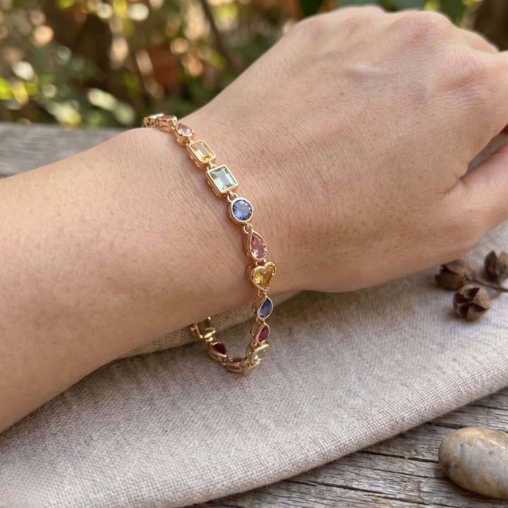 Colorful gemstone bracelet available in white, yellow and rose gold.