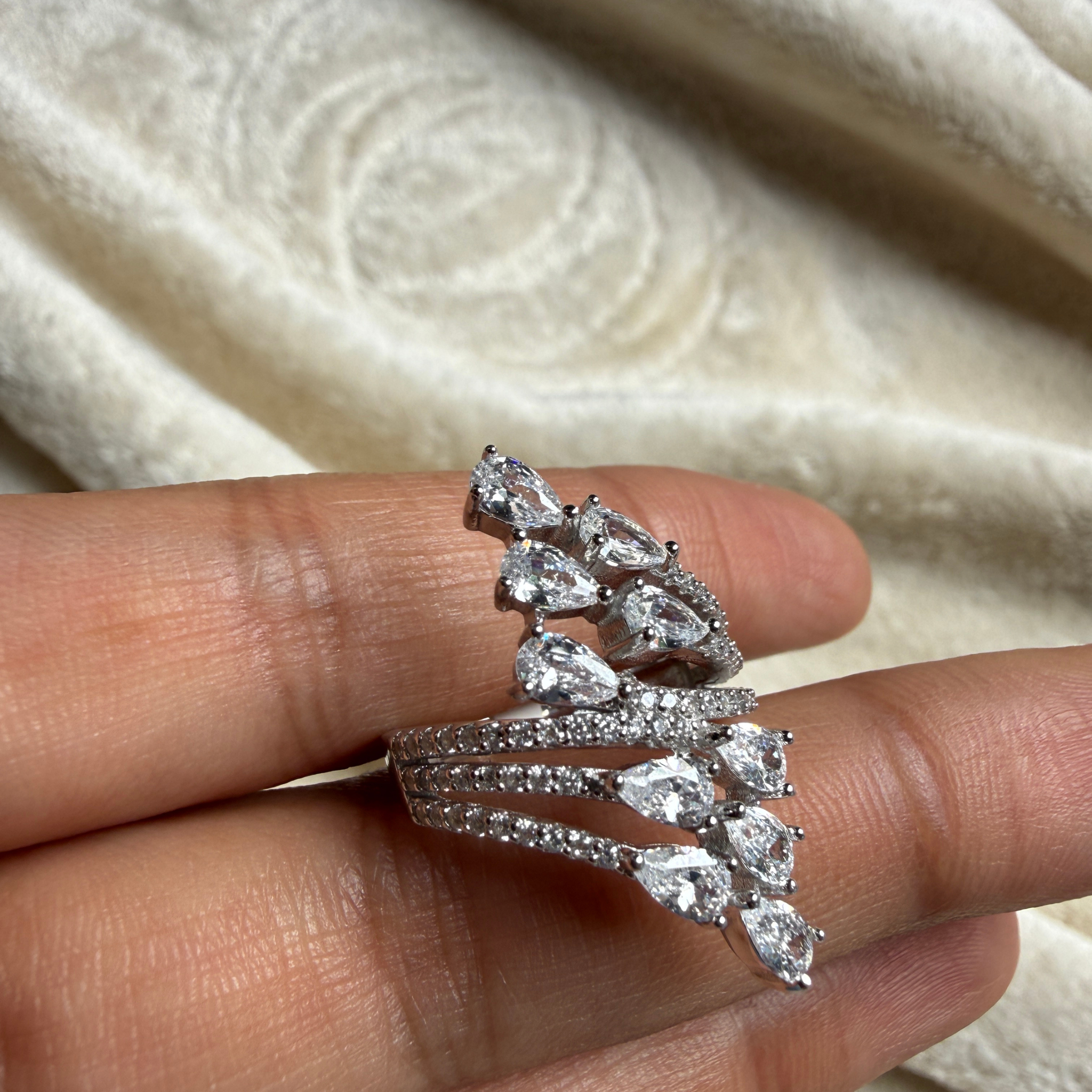 Pear leaf lab-grown diamond wrap ring in white gold by Kiashaa Jewellery.