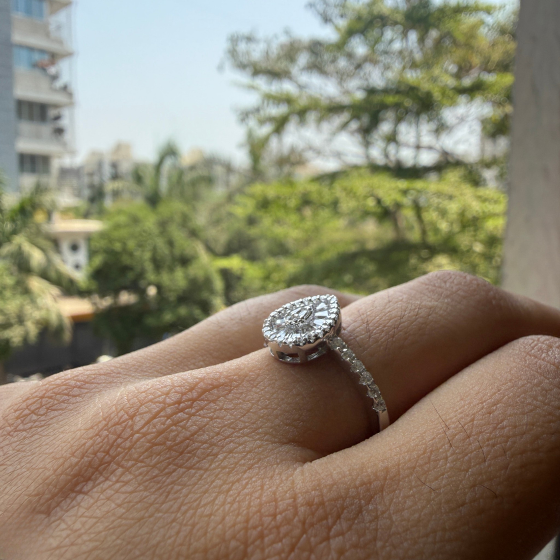 Luxury pear cluster engagement ring handcrafted in 9K, 14K and 18K gold.