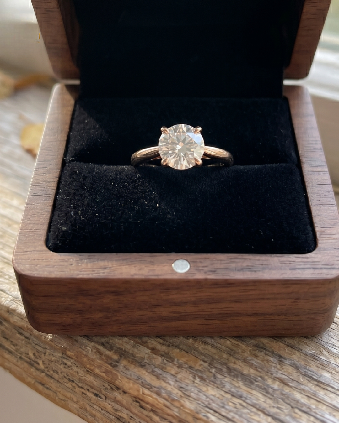 Luxury round lab-grown diamond solitaire ring by Kiashaa Jewellery in rose gold with a sparkling hidden halo.