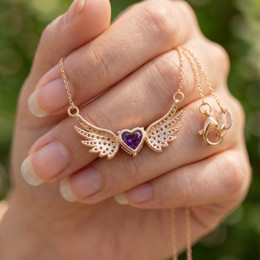 Purple heart gemstone angel wing pendant necklace in rose gold by Kiashaa Jewellery.