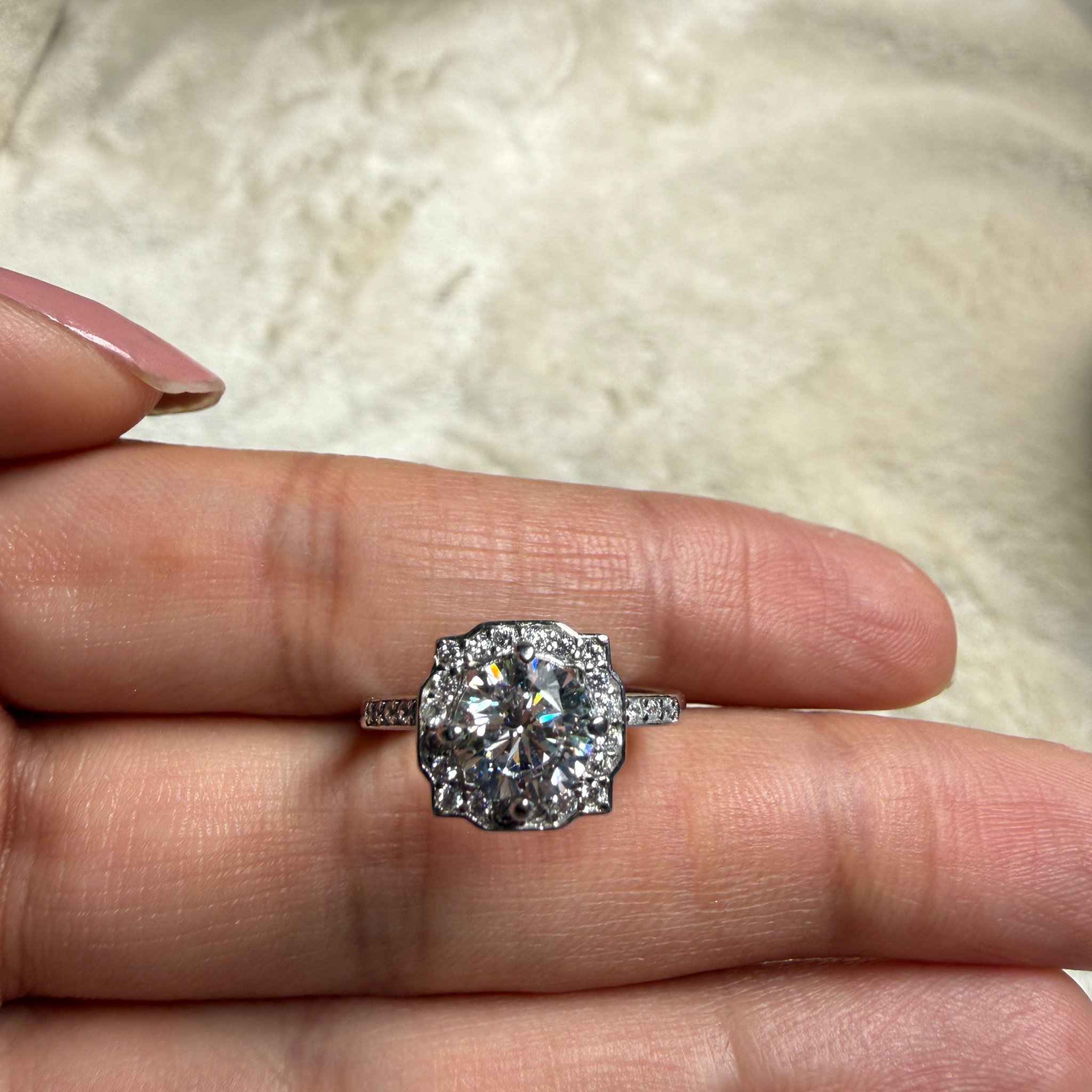 Vintage round lab-grown diamond halo ring in white gold by Kiashaa Jewellery.