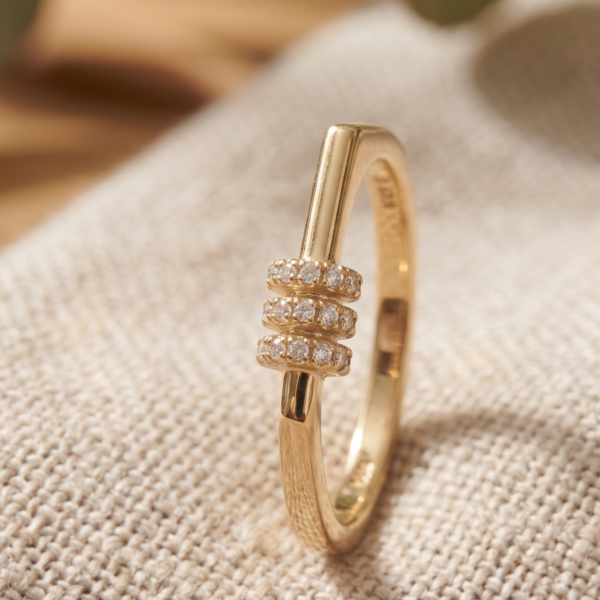 Kiashaa Jewellery 0.21 CTW triple-row diamond ring in polished yellow gold.