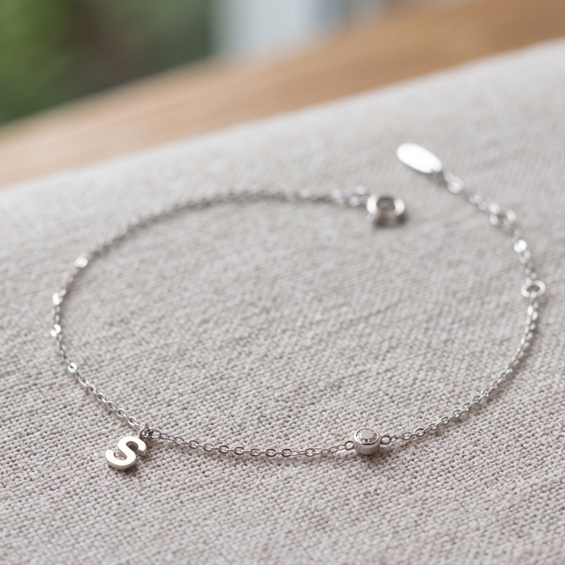 Kiashaa Jewellery personalized initial bracelet with 2.5 mm round diamond in yellow gold.