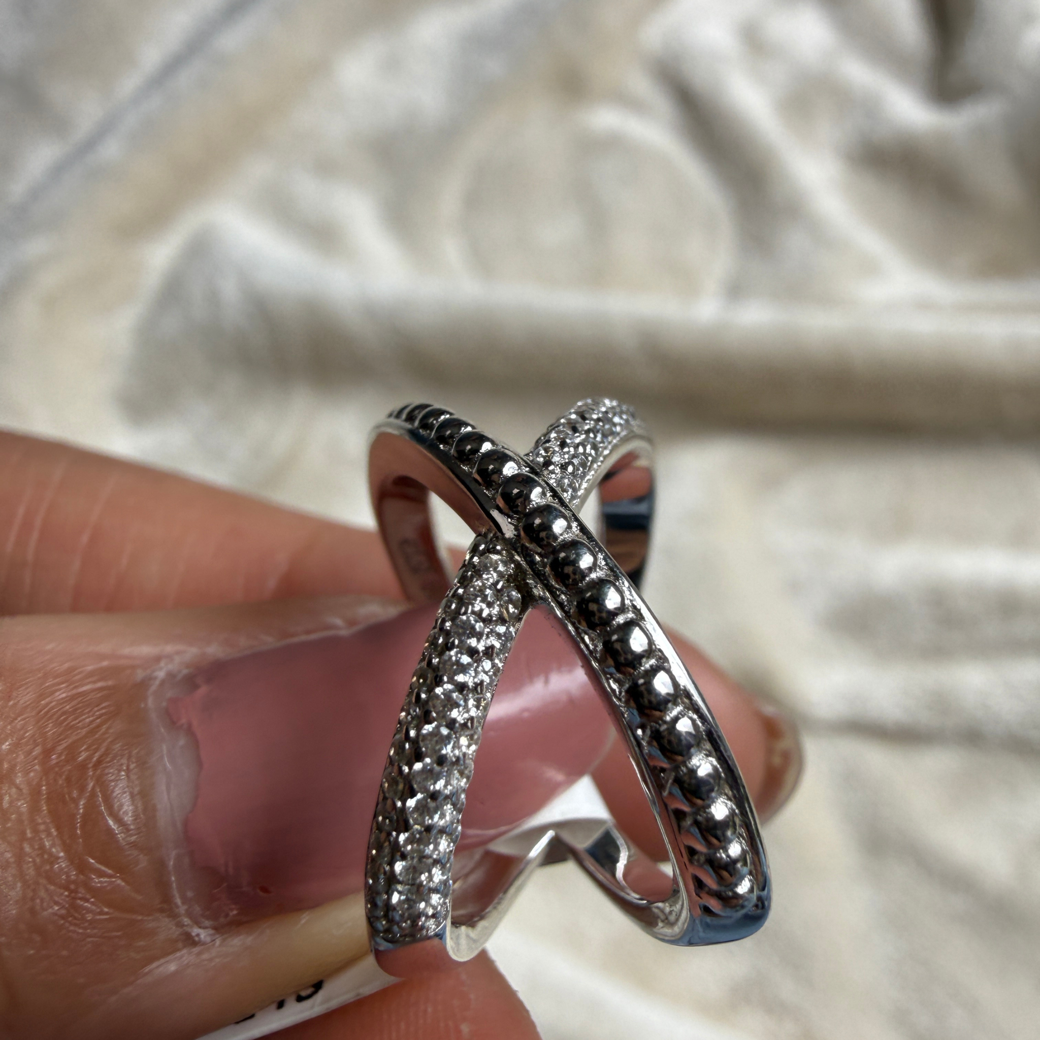 Criss-cross lab-grown diamond X ring in white gold by Kiashaa Jewellery.