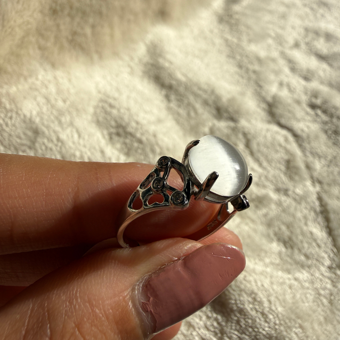 White cat's eye gemstone and lab-grown diamond ring by Kiashaa Jewellery.