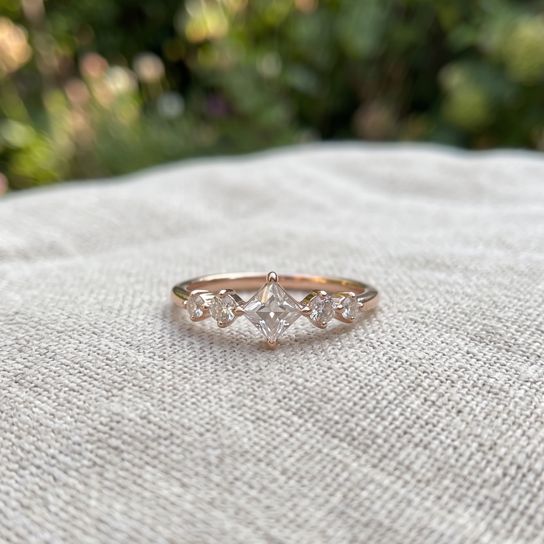 Kiashaa Jewellery 0.764 CTW princess and round diamond ring in polished rose gold.