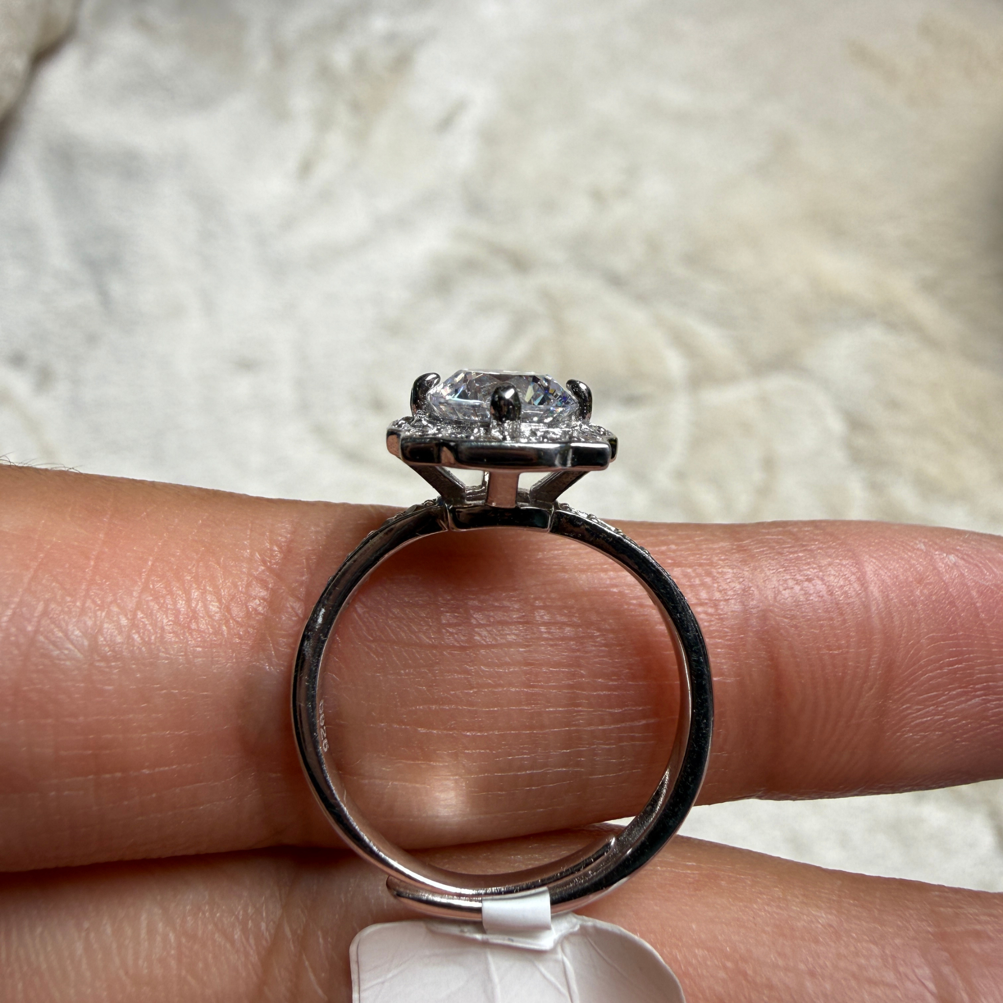Vintage round lab-grown diamond halo ring in white gold by Kiashaa Jewellery.