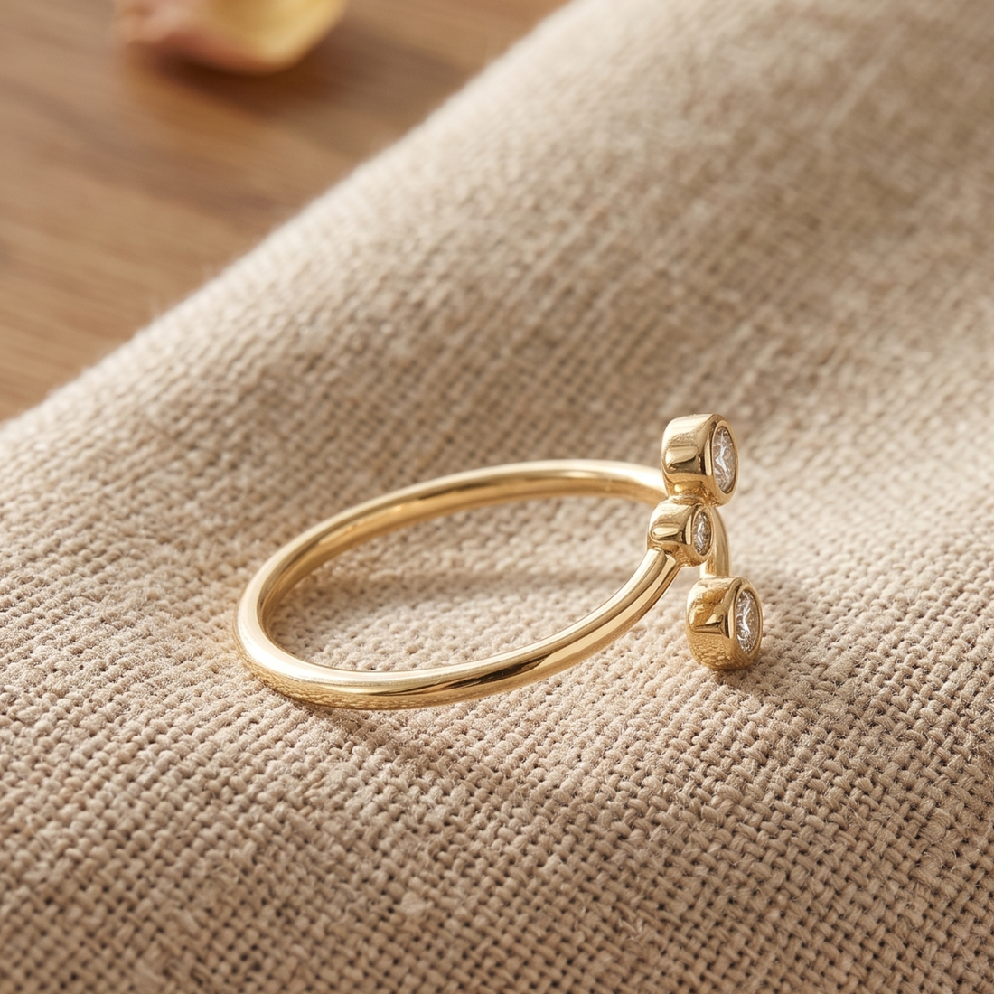 Kiashaa Jewellery 0.295 CTW round diamond open bypass ring in polished yellow gold.