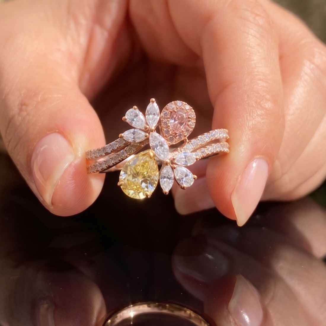 Aurora Bloom 3 CTW multi-color diamond floral ring by Kiashaa Jewellery with yellow and pink pear-shaped diamonds.