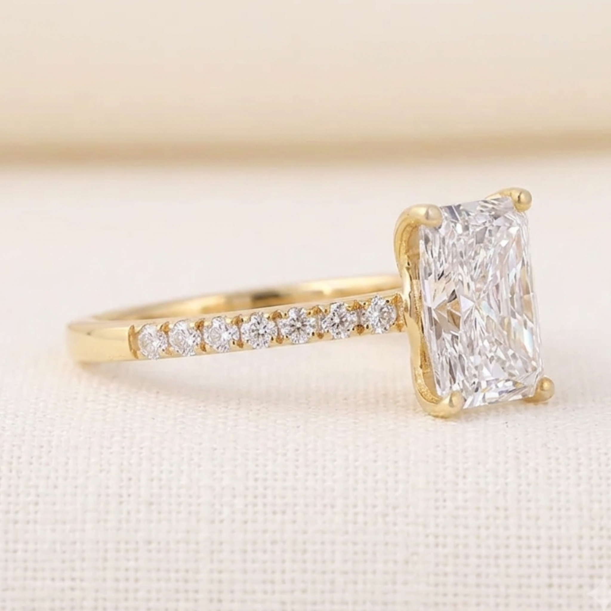 Luxury emerald-cut engagement ring available in yellow white and rose gold