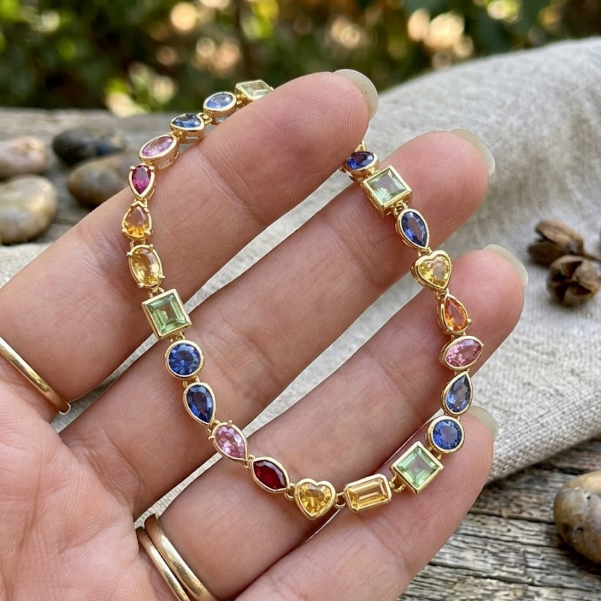 Colorful gemstone bracelet available in white, yellow and rose gold.
