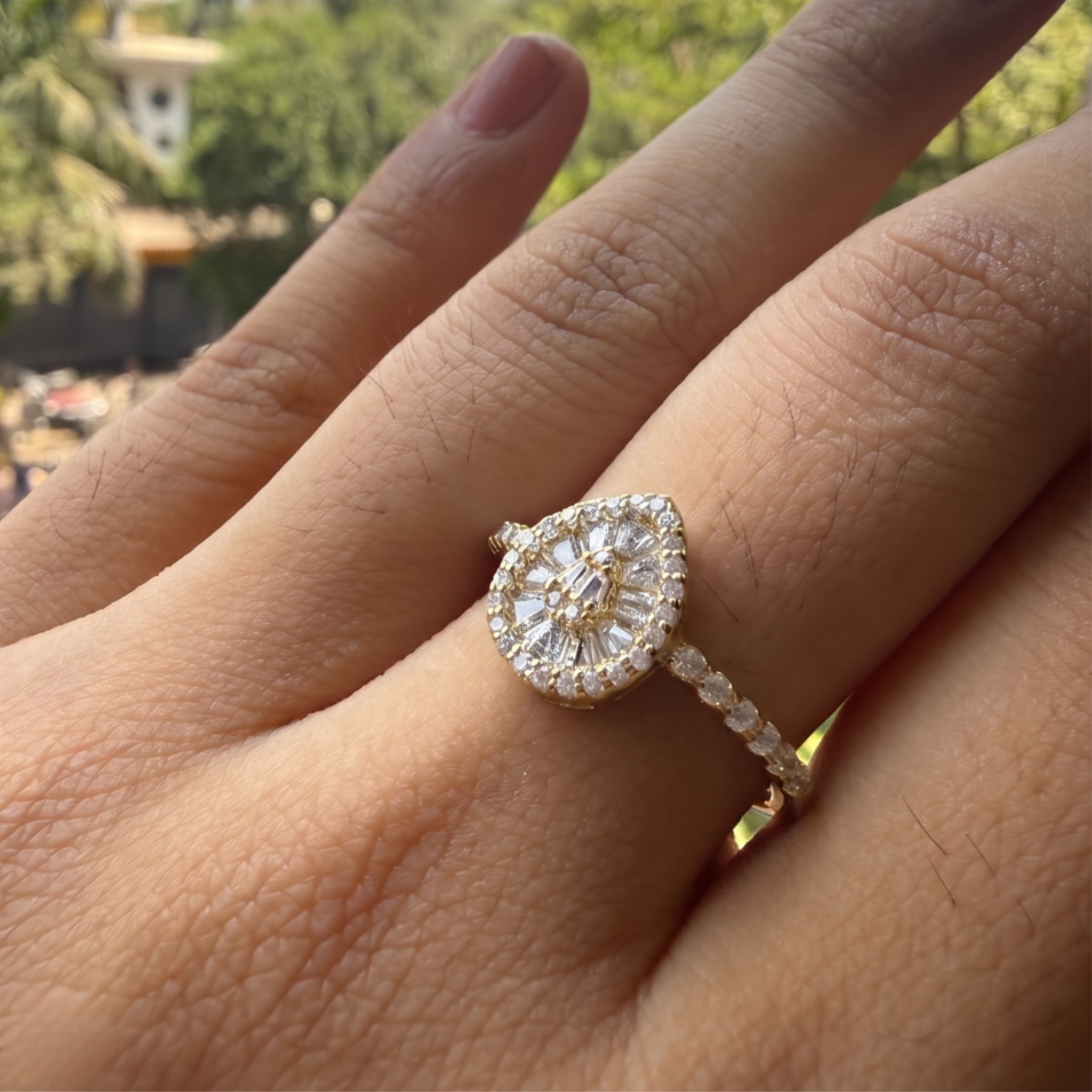 Luxury pear cluster engagement ring handcrafted in 9K, 14K and 18K gold.