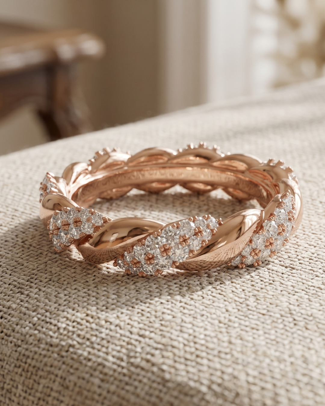 Ladies braided diamond band by Kiashaa Jewellery in rose gold with round lab-grown diamond cluster sections.