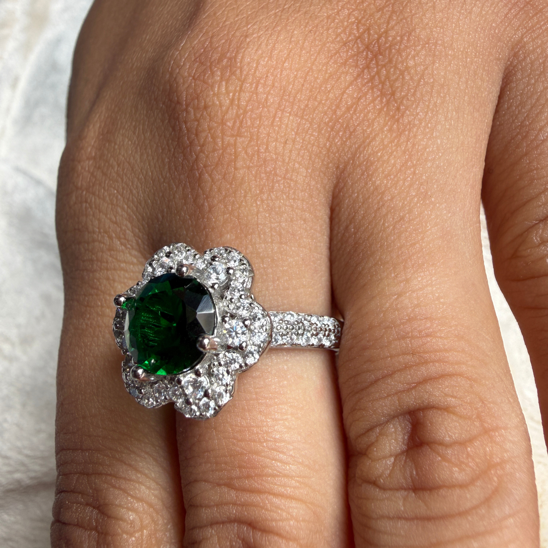 Green gemstone floral halo ring with lab-grown diamonds by Kiashaa Jewellery.