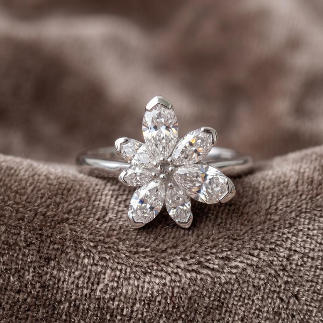 Élan Bloom 2 CTW pear diamond flower ring by Kiashaa Jewellery featuring approximately seven pear-shaped diamond petals.