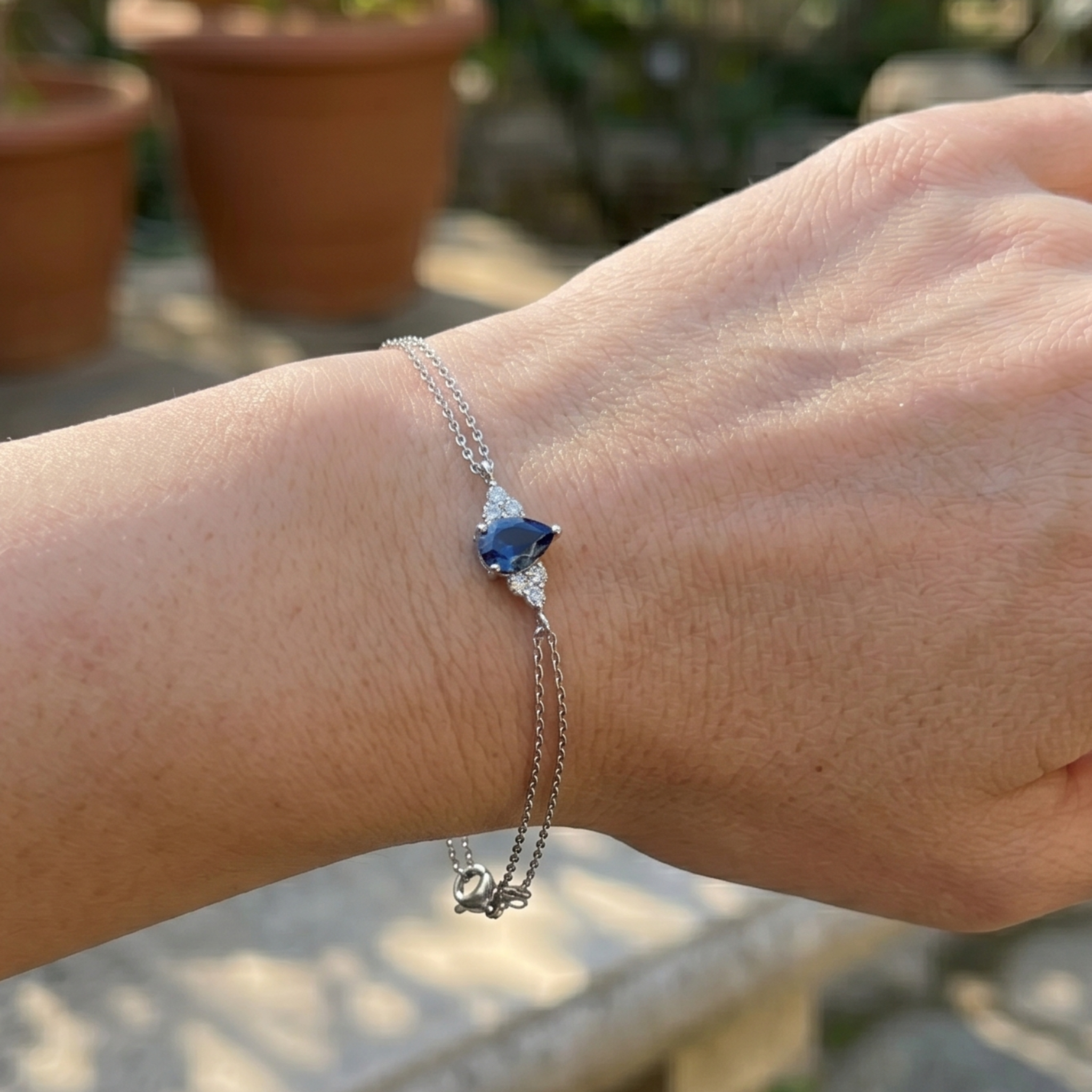 Azure Tear 1.25 CT Pear Blue Gemstone Diamond Bracelet