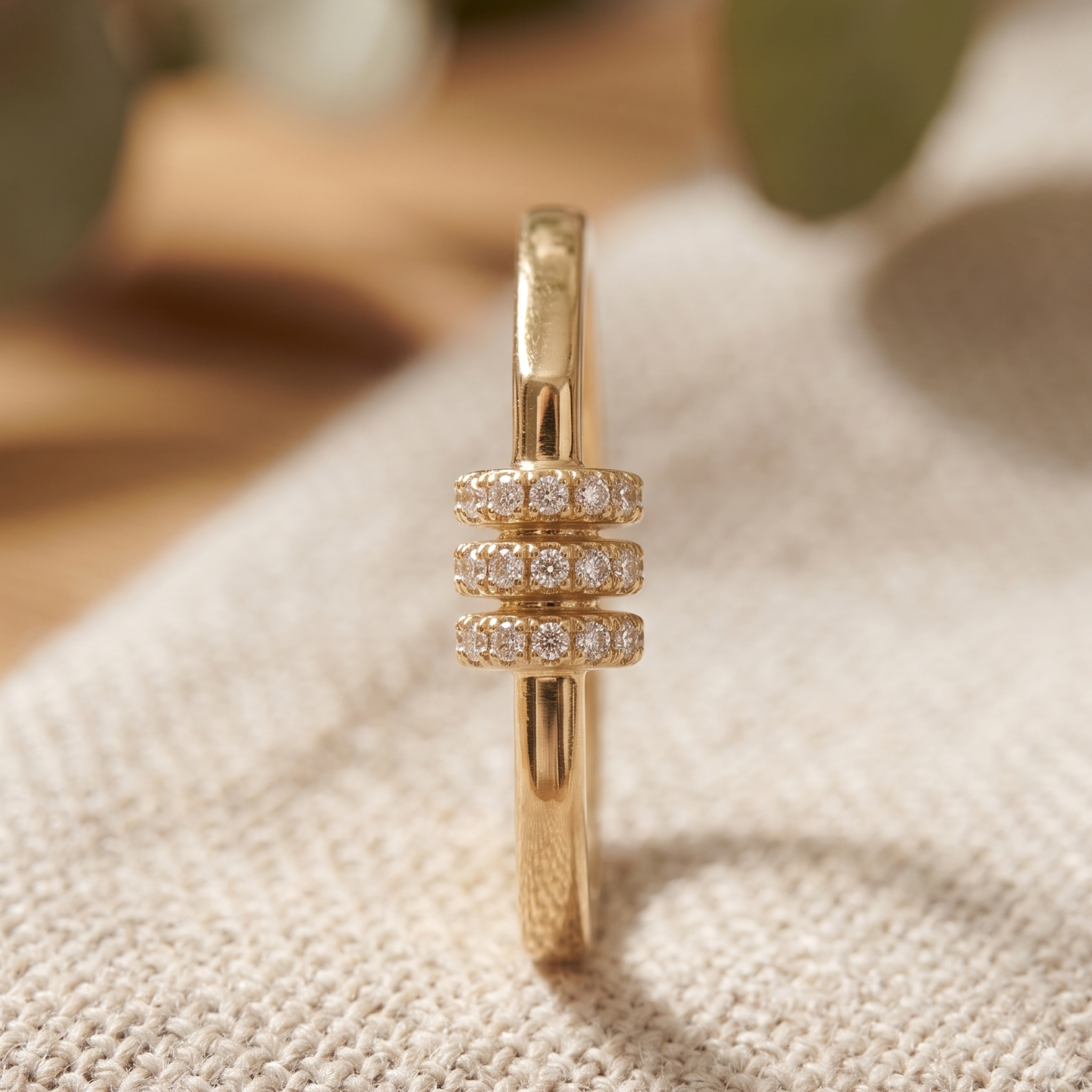 Kiashaa Jewellery 0.21 CTW triple-row diamond ring in polished yellow gold.