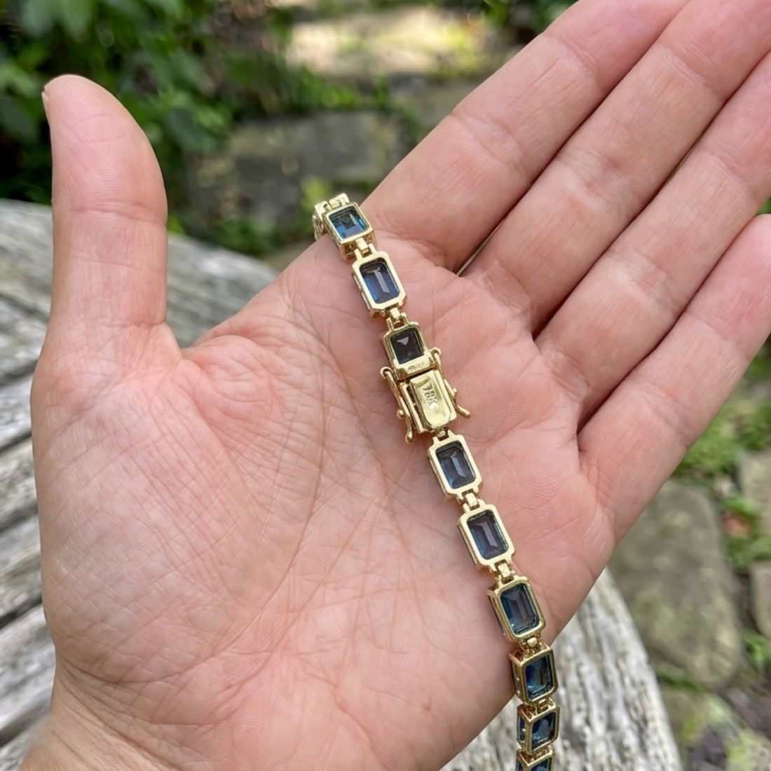 Classic gemstone tennis bracelet available in white, yellow, and rose gold.