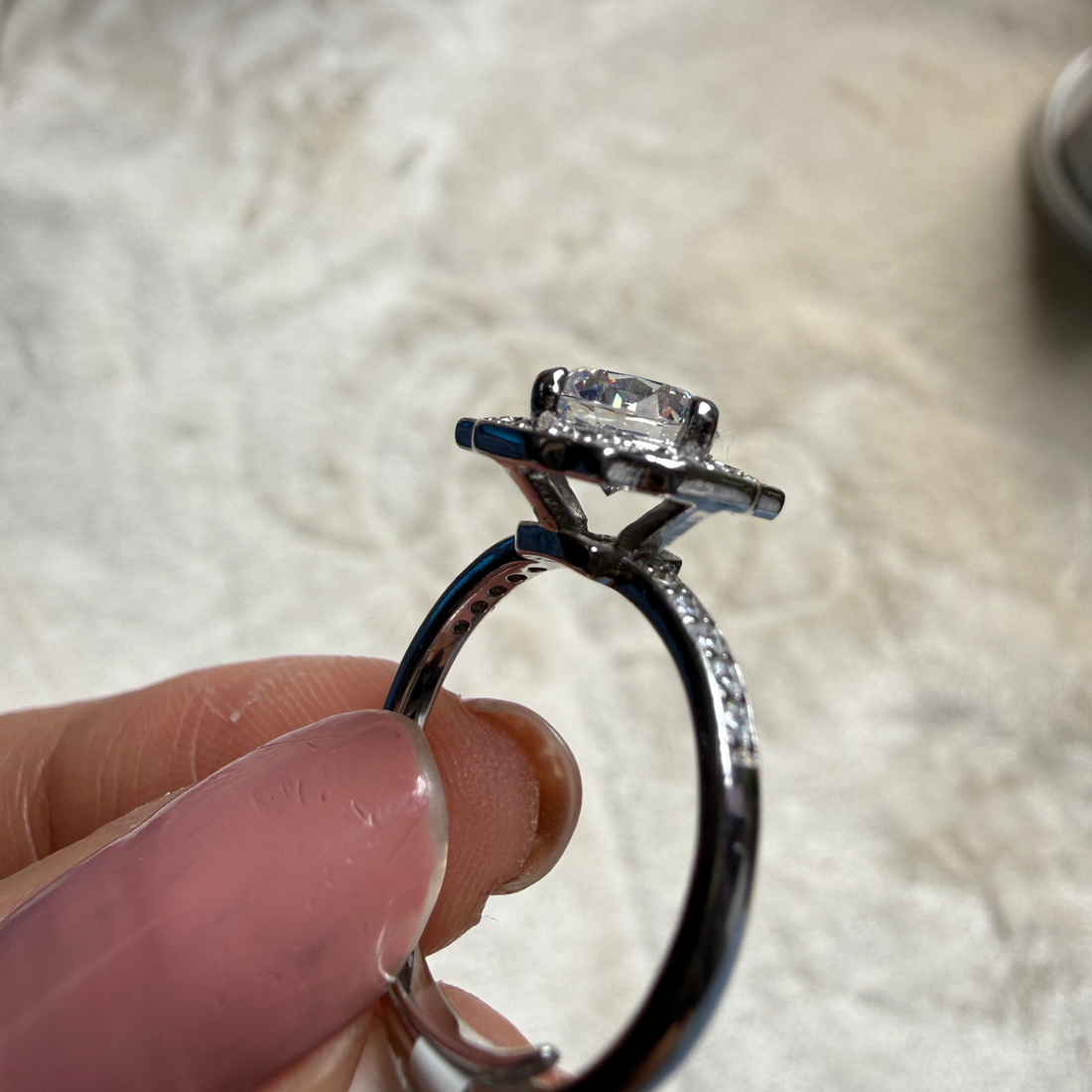 Vintage round lab-grown diamond halo ring in white gold by Kiashaa Jewellery.