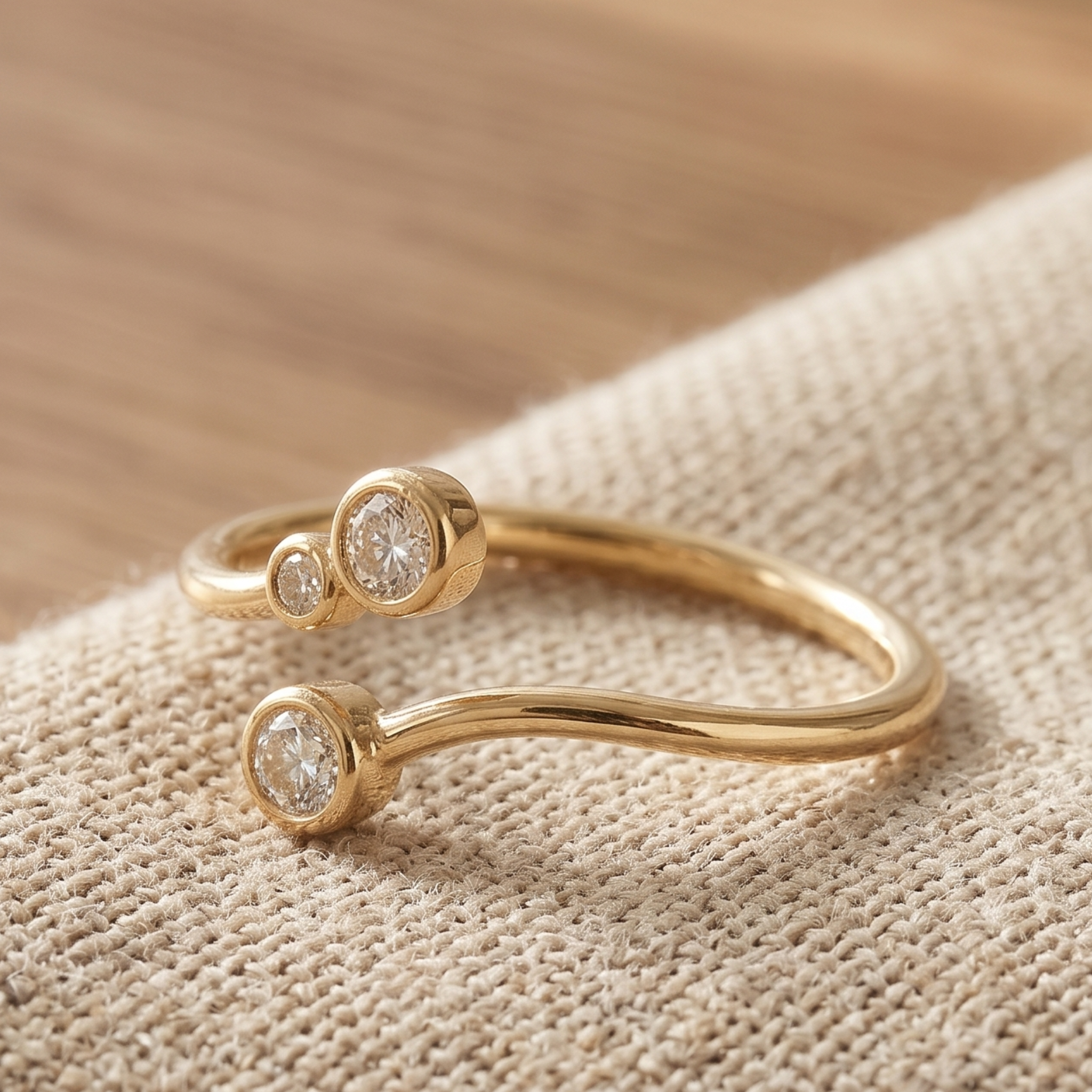 Kiashaa Jewellery 0.295 CTW round diamond open bypass ring in polished yellow gold.