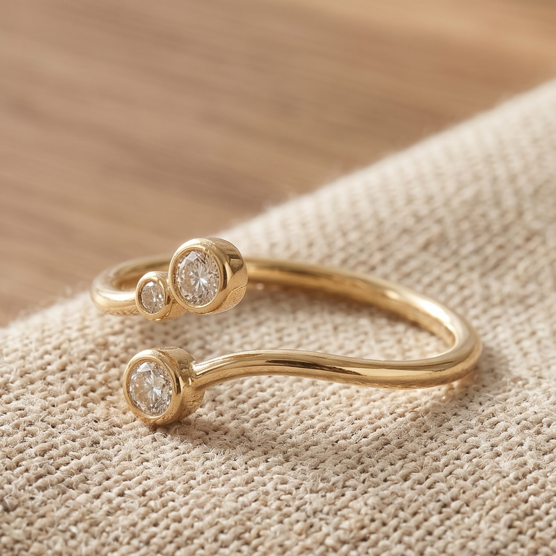 Kiashaa Jewellery 0.295 CTW round diamond open bypass ring in polished yellow gold.