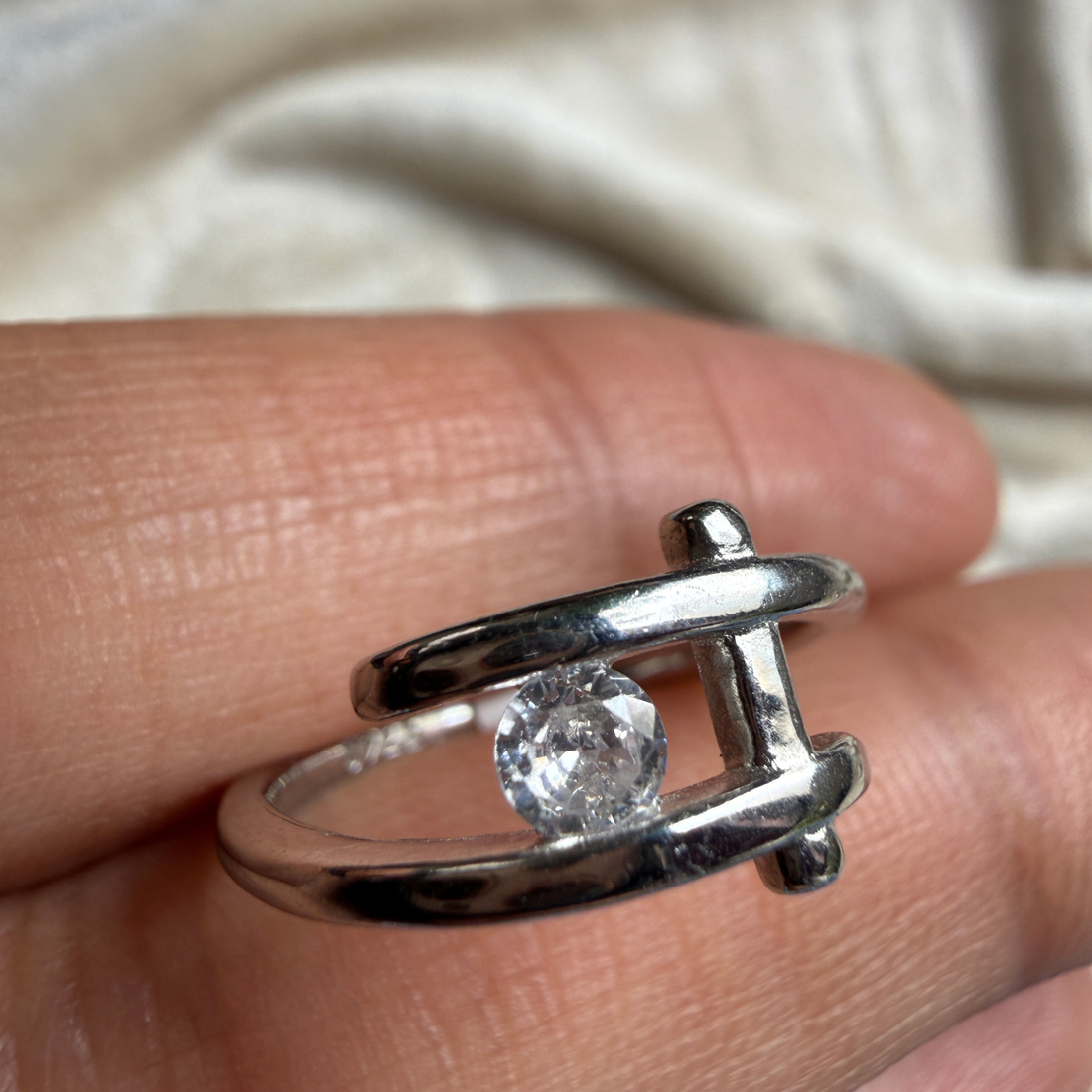 Modern round lab-grown diamond open ring in white gold by Kiashaa Jewellery.