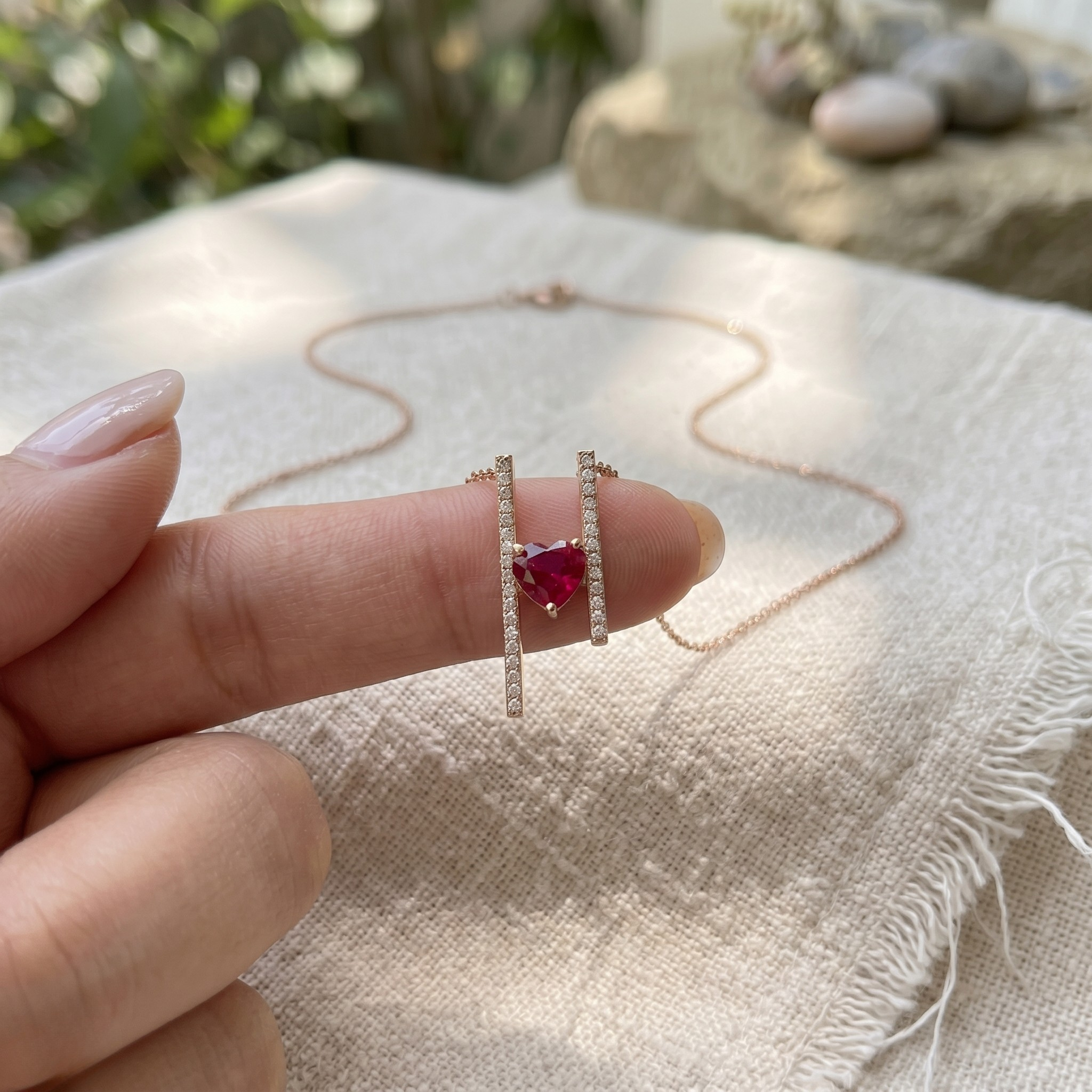 Red heart gemstone and lab-grown diamond pendant necklace by Kiashaa Jewellery in rose gold.