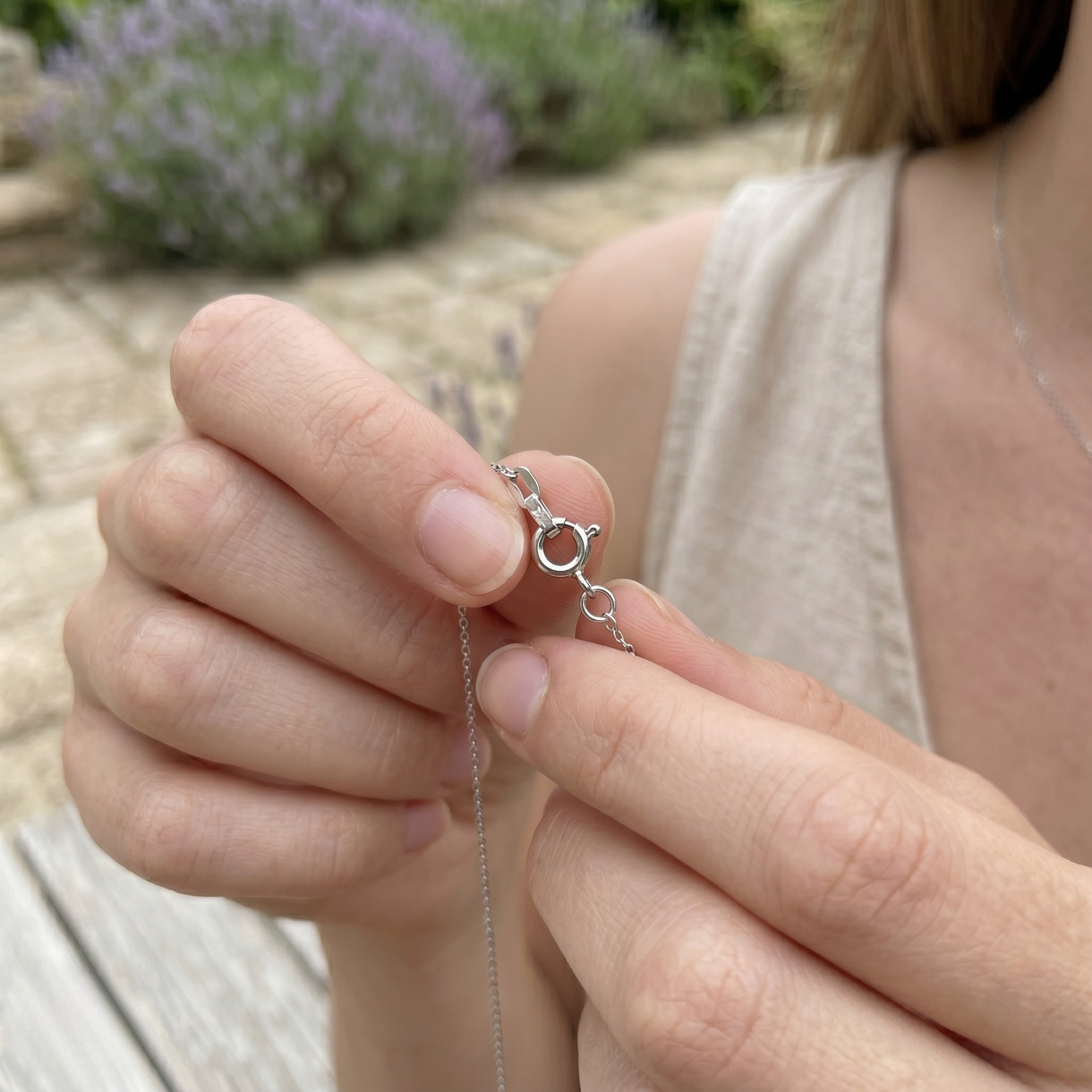 Blue and pink gemstone cherry pendant necklace with marquise lab-grown diamonds by Kiashaa Jewellery.