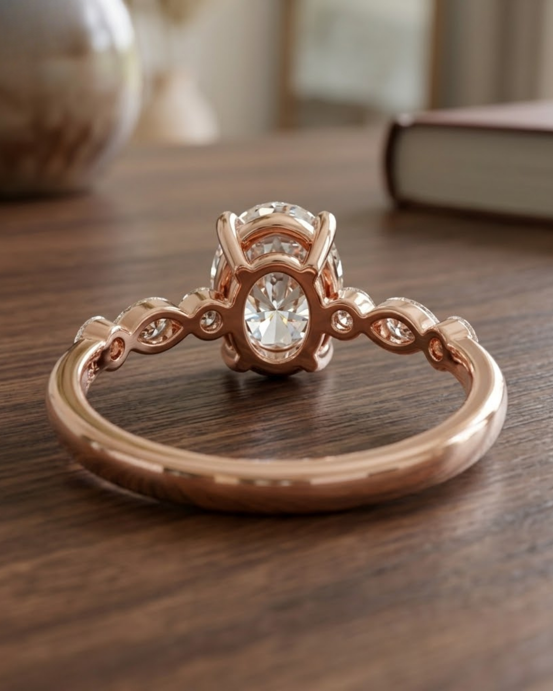 Ladies oval-cut lab-grown diamond engagement ring by Kiashaa Jewellery with round diamond accent detailing.